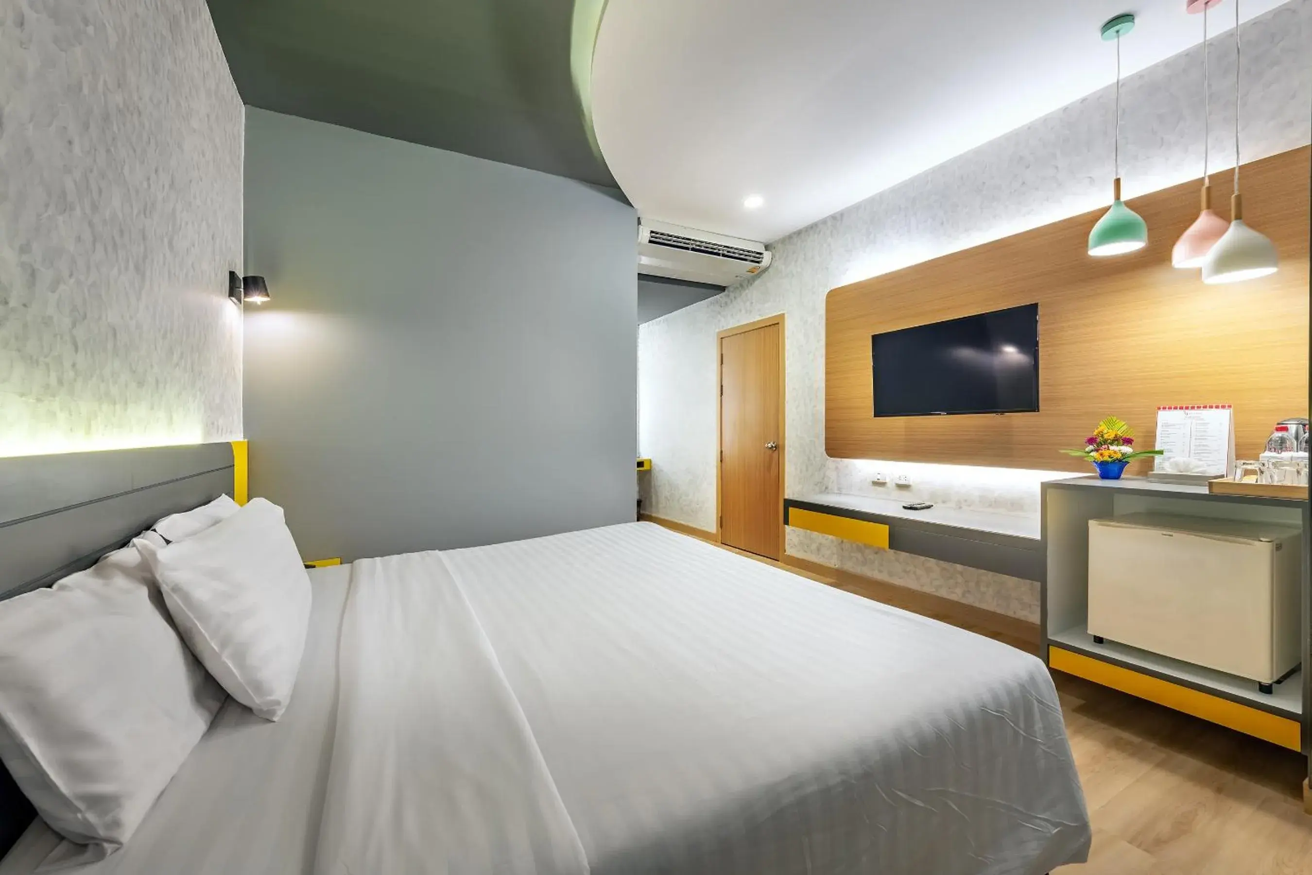 Bed in Qiu Hotel Sukhumvit - BTS On Nut Station Bed in Qiu Hotel Sukhumvit - BTS On Nut Station