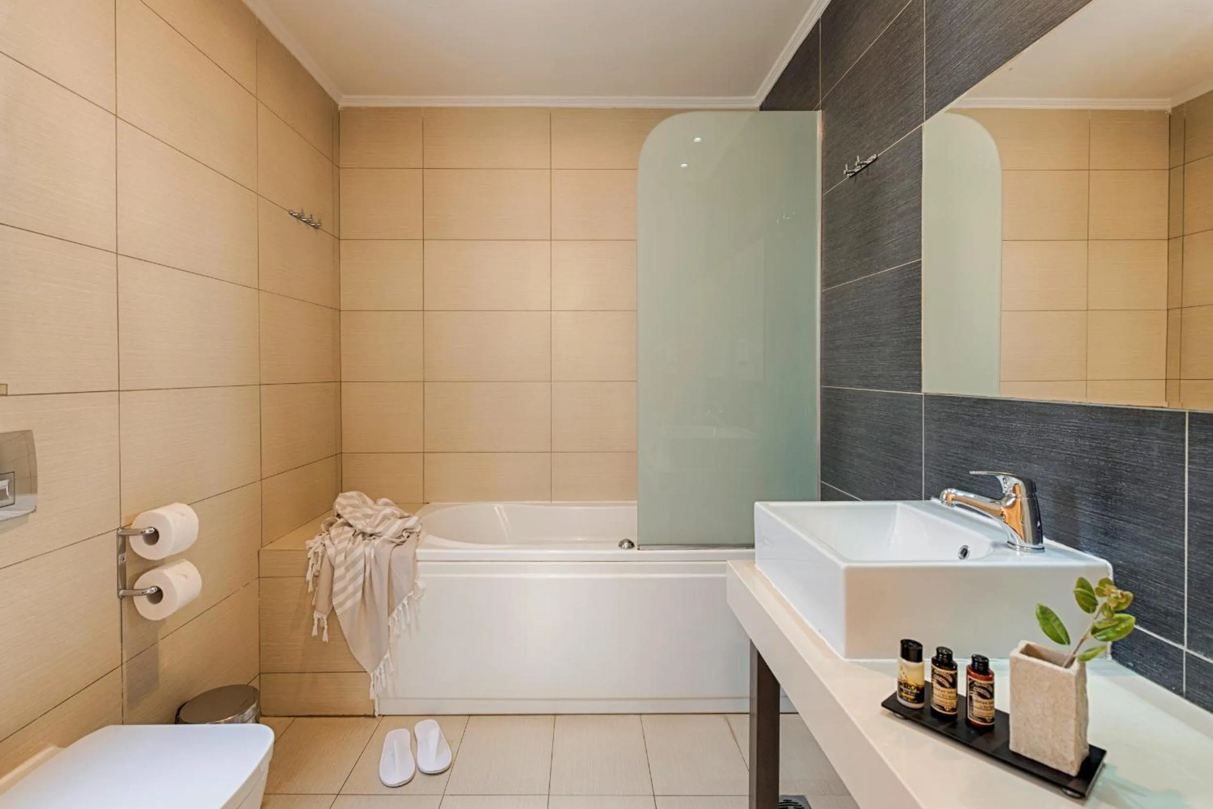 Shower in Villa Di Mare Seaside Suites