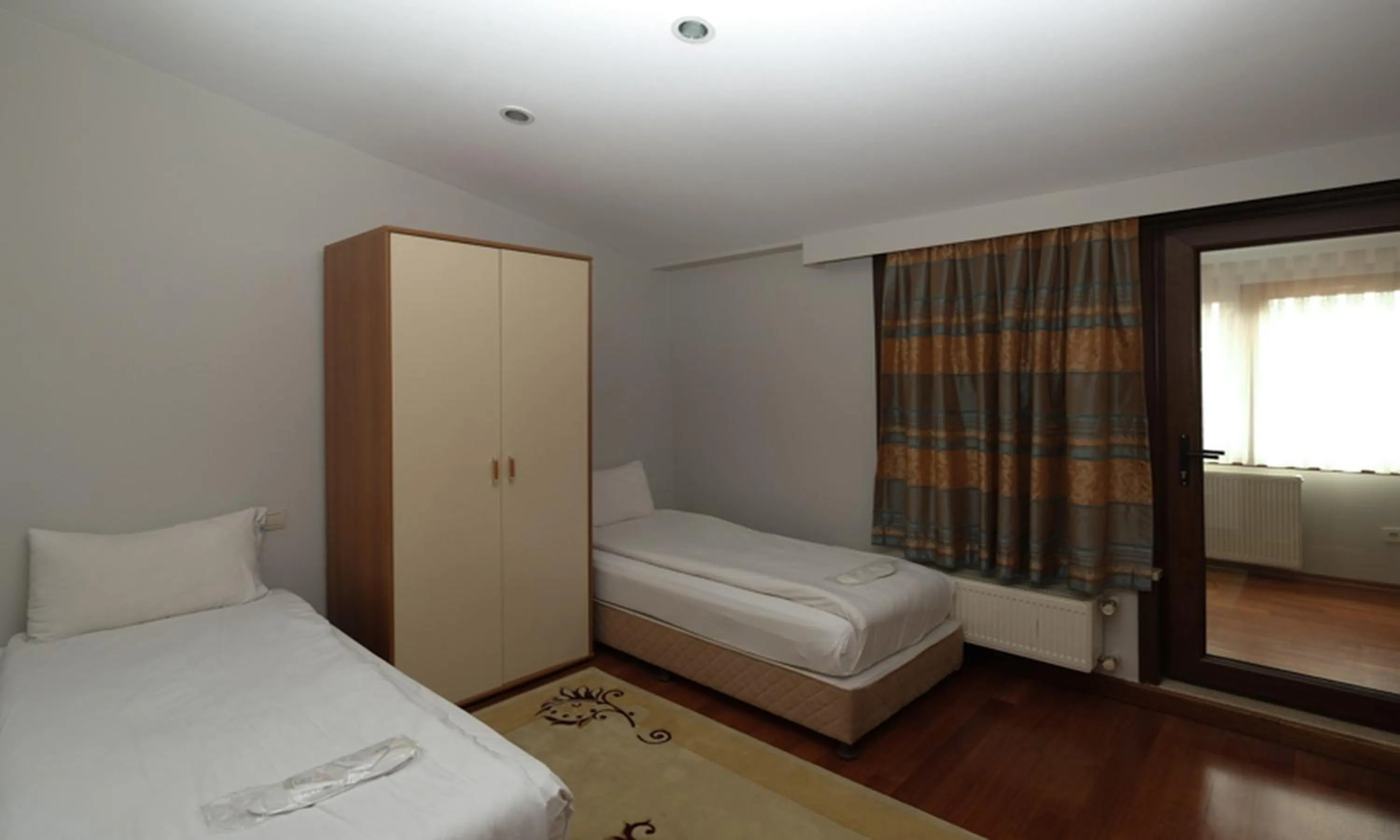 Bed in Belle Maison Hotel&Residence