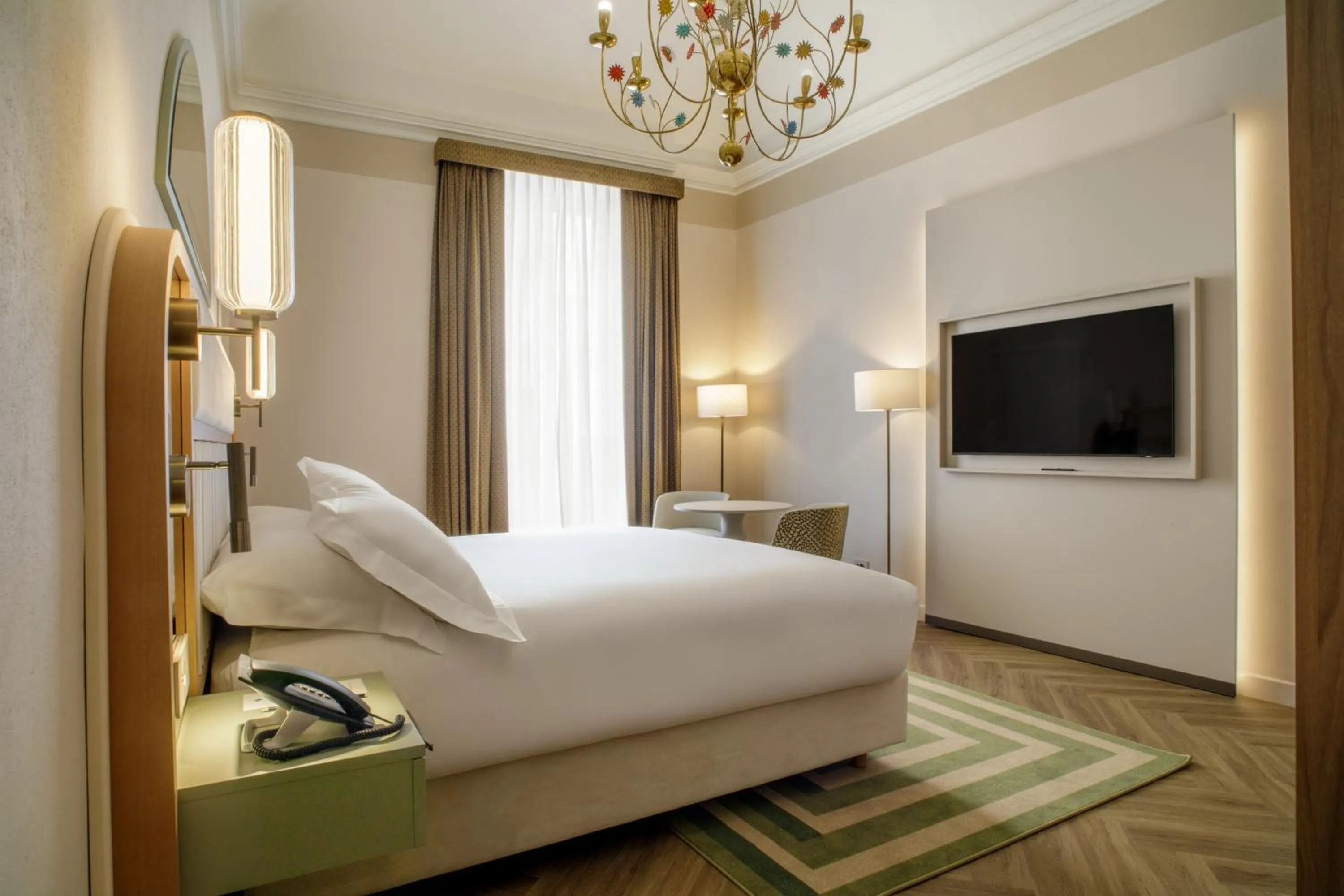 Bed in Rosetta Hotel Perugia Tapestry Collection By Hilton