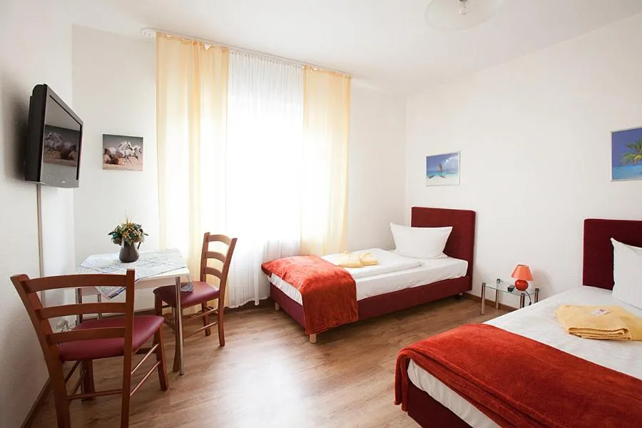Photo of the whole room, Bed in Pension Jasmin