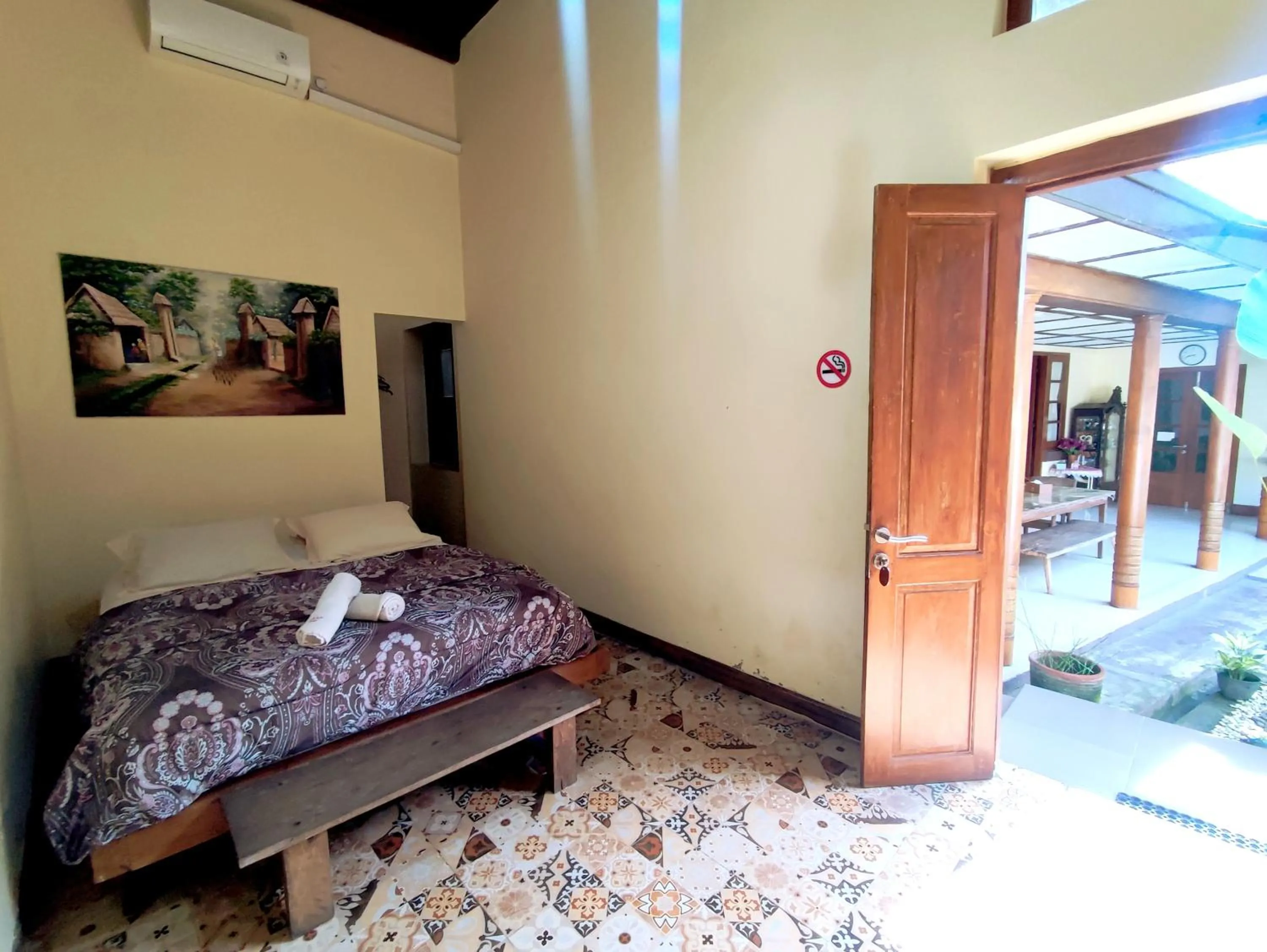 Bed in Doeloerkoe Homestay