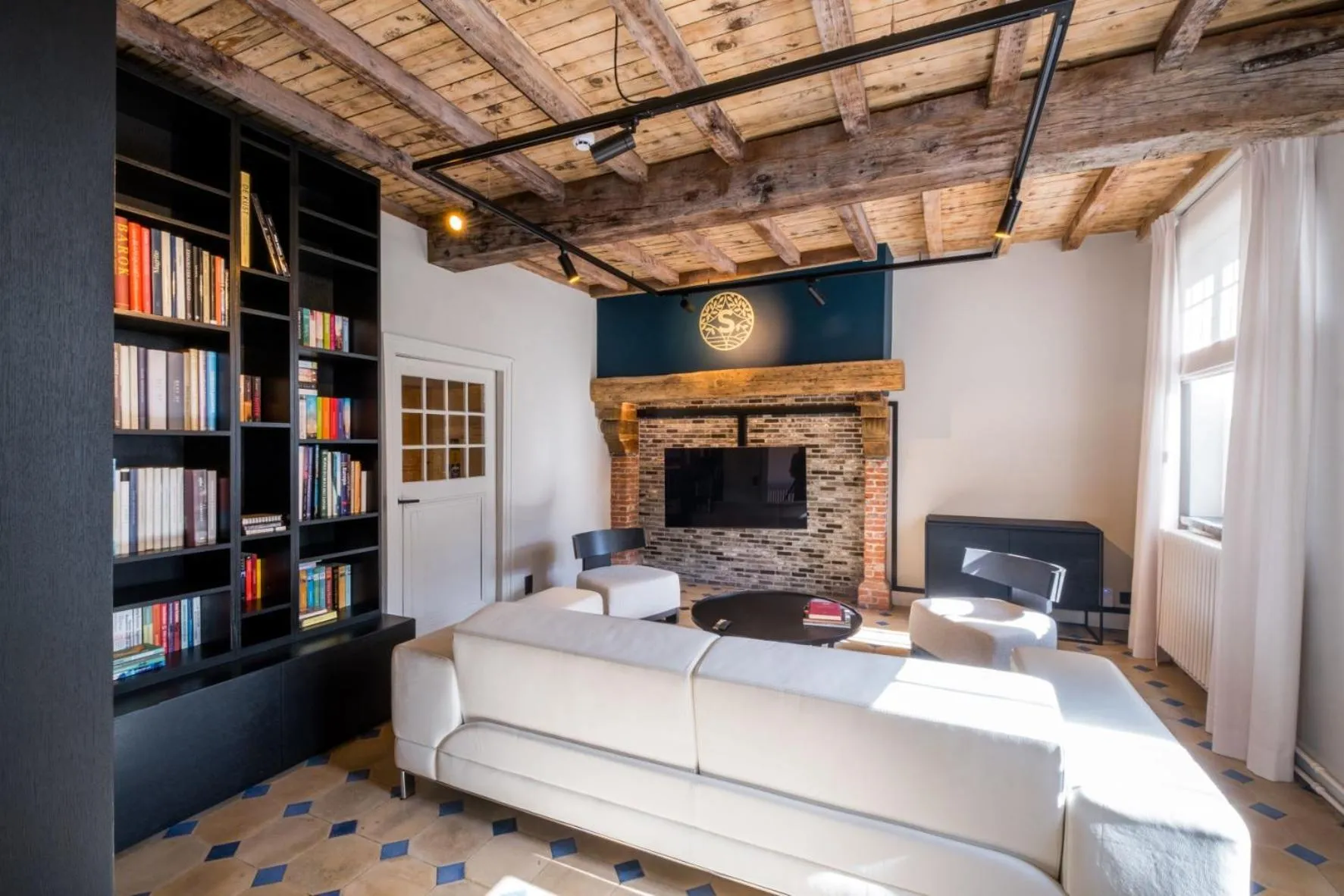 Communal lounge/ TV room in B&B Sterckxhof