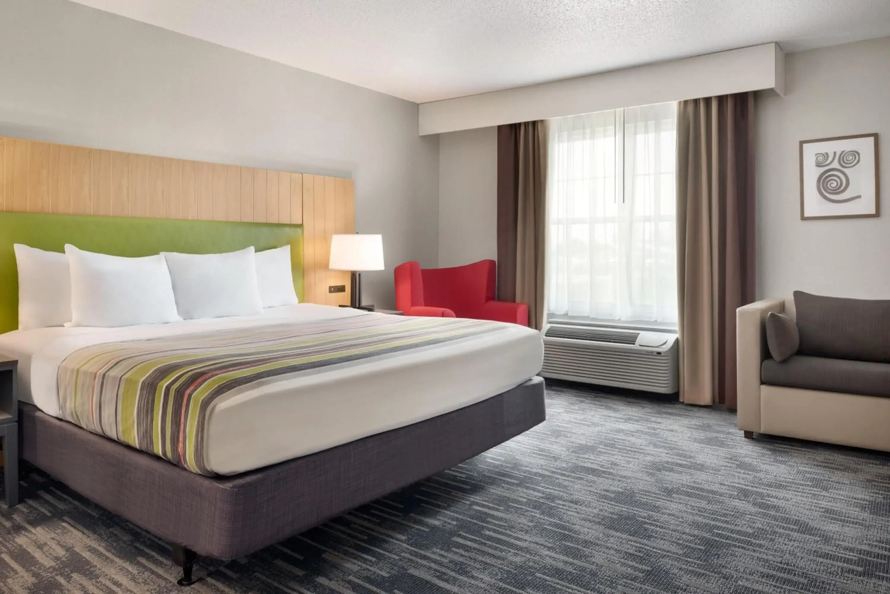 Bedroom, Bed in Country Inn & Suites by Radisson, Pella, IA Bedroom, Bed in Country Inn & Suites by Radisson, Pella, IA