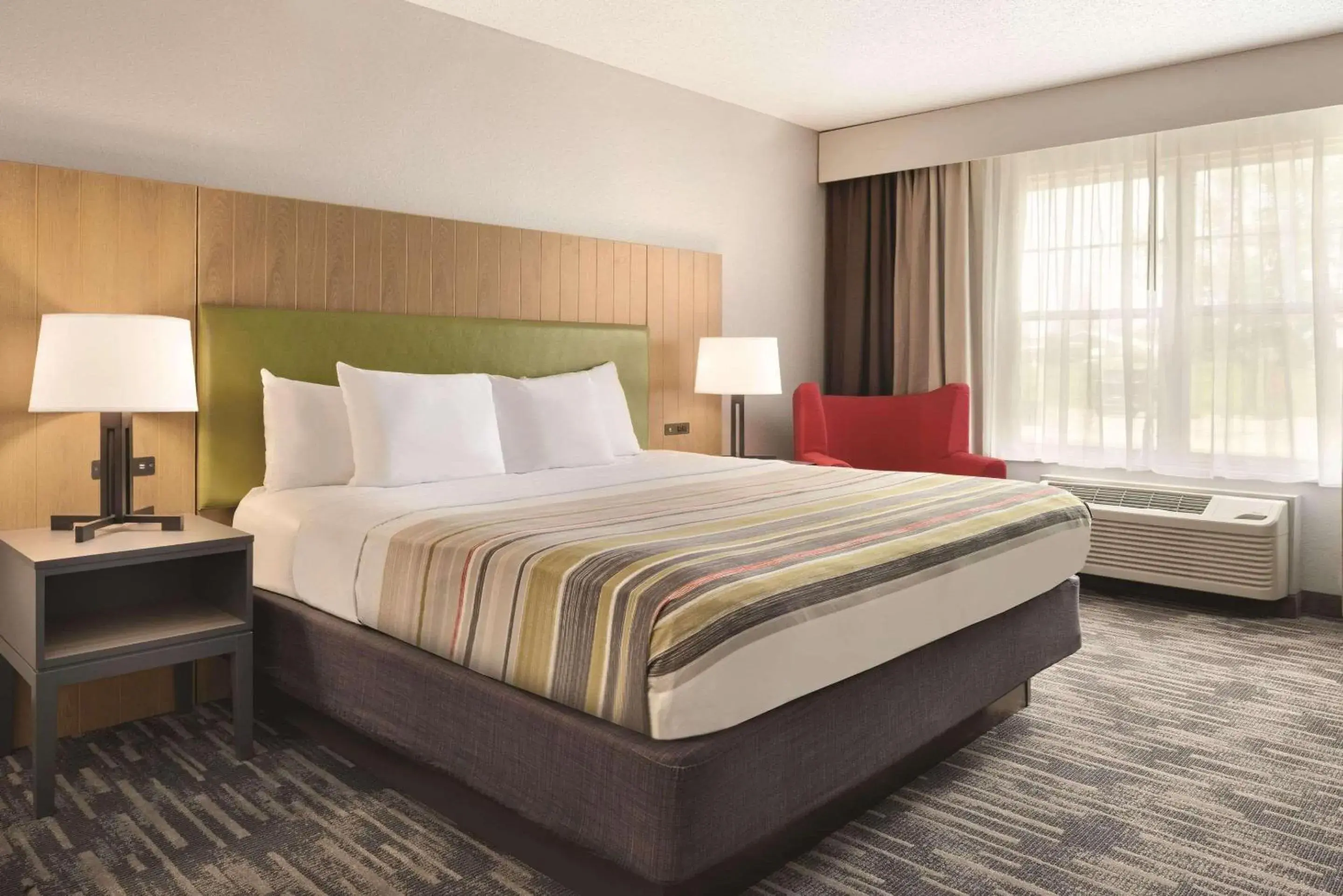 Bedroom, Bed in Country Inn & Suites by Radisson, Pella, IA Bedroom, Bed in Country Inn & Suites by Radisson, Pella, IA