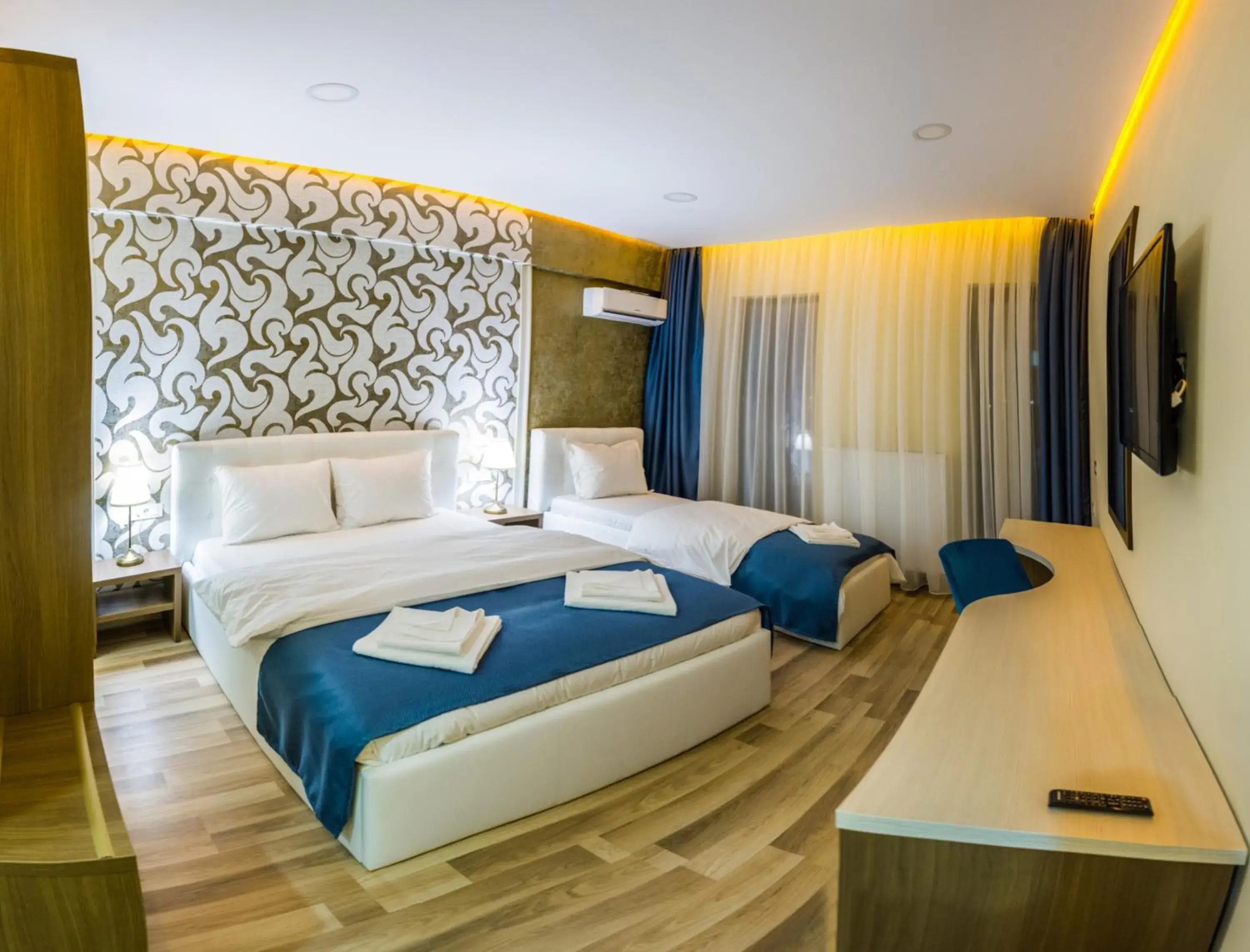 Deluxe Triple Room in Monopoly Hotel Deluxe Triple Room in Monopoly Hotel