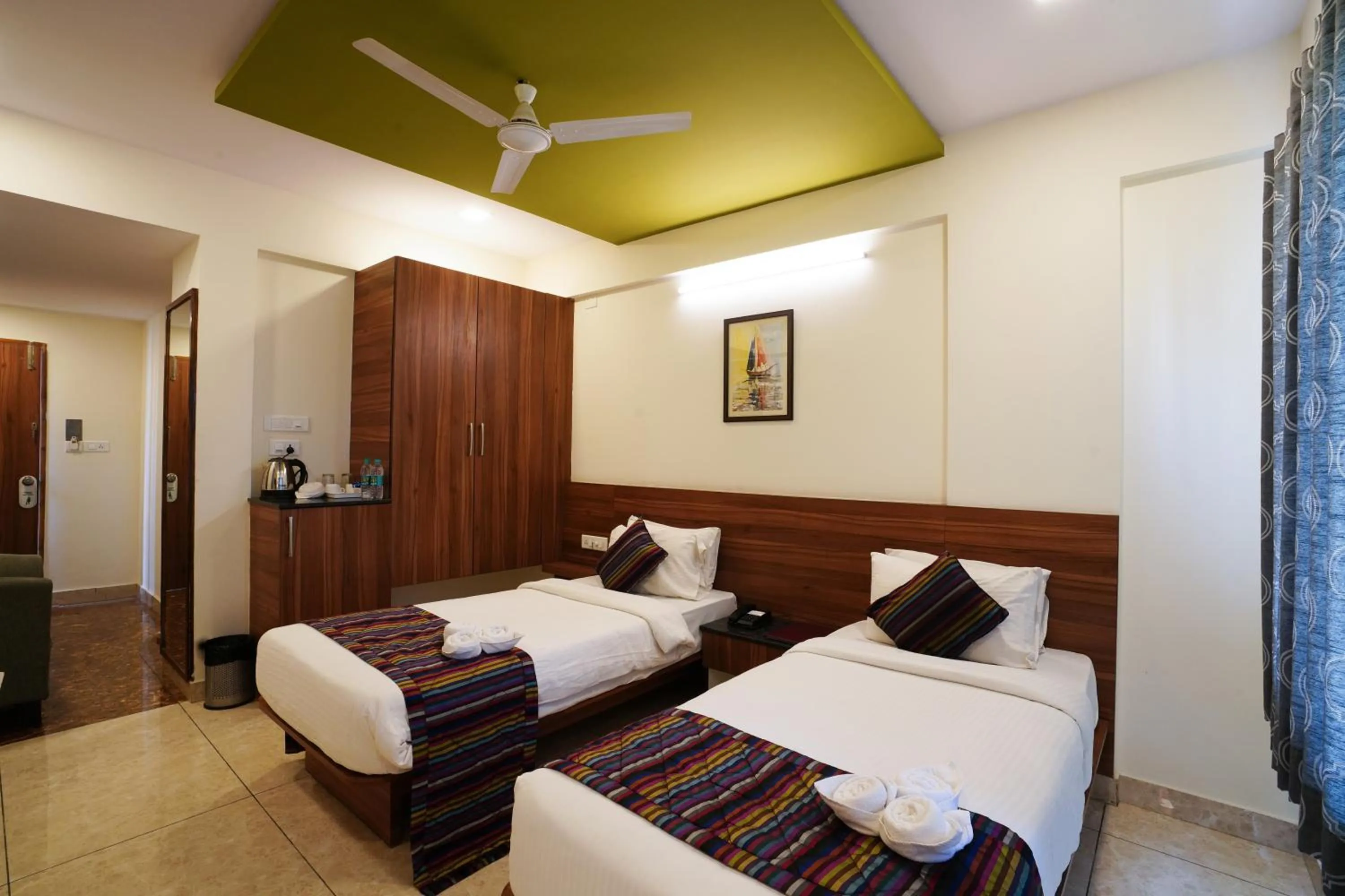 Bed in Silicon Inn Hotel Bangalore Airport