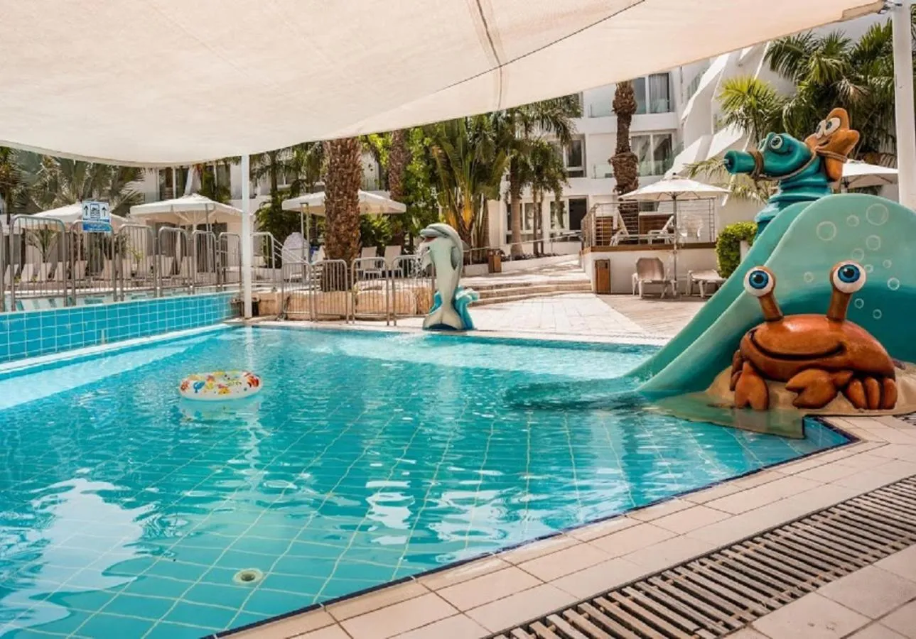 Swimming pool in Astral Palma Hotel