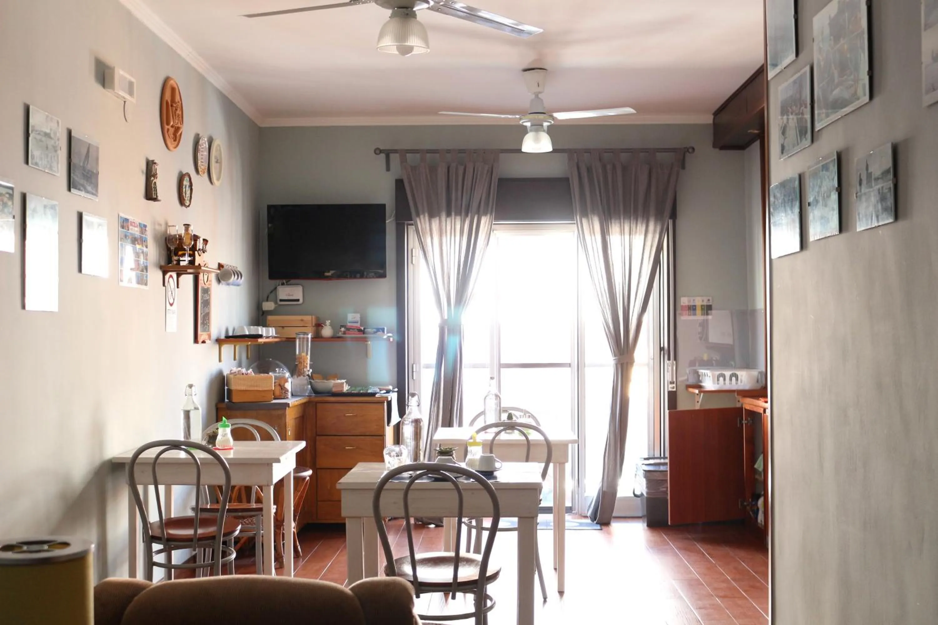 Communal lounge/ TV room in b&b La Murina