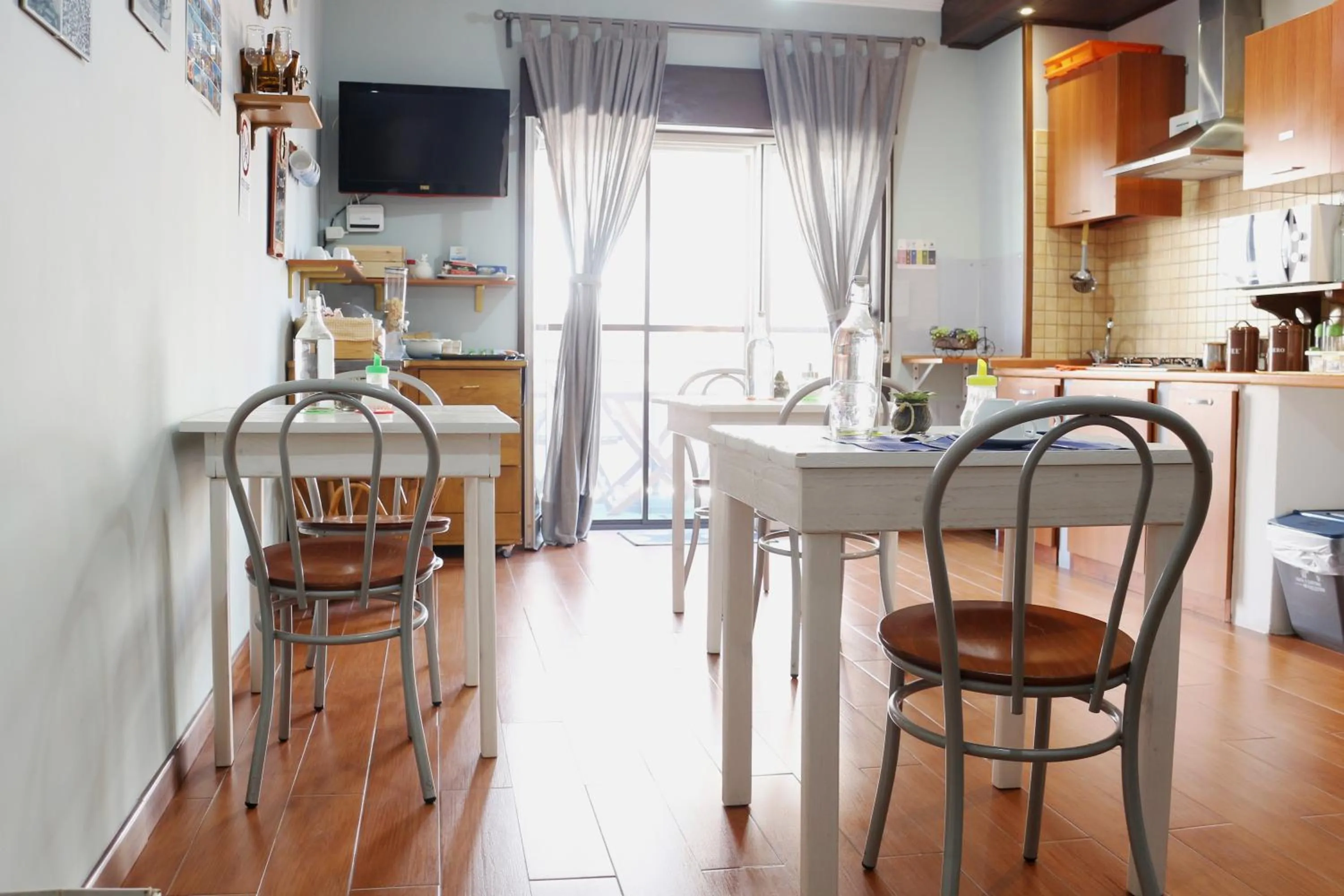 Communal lounge/ TV room in b&b La Murina