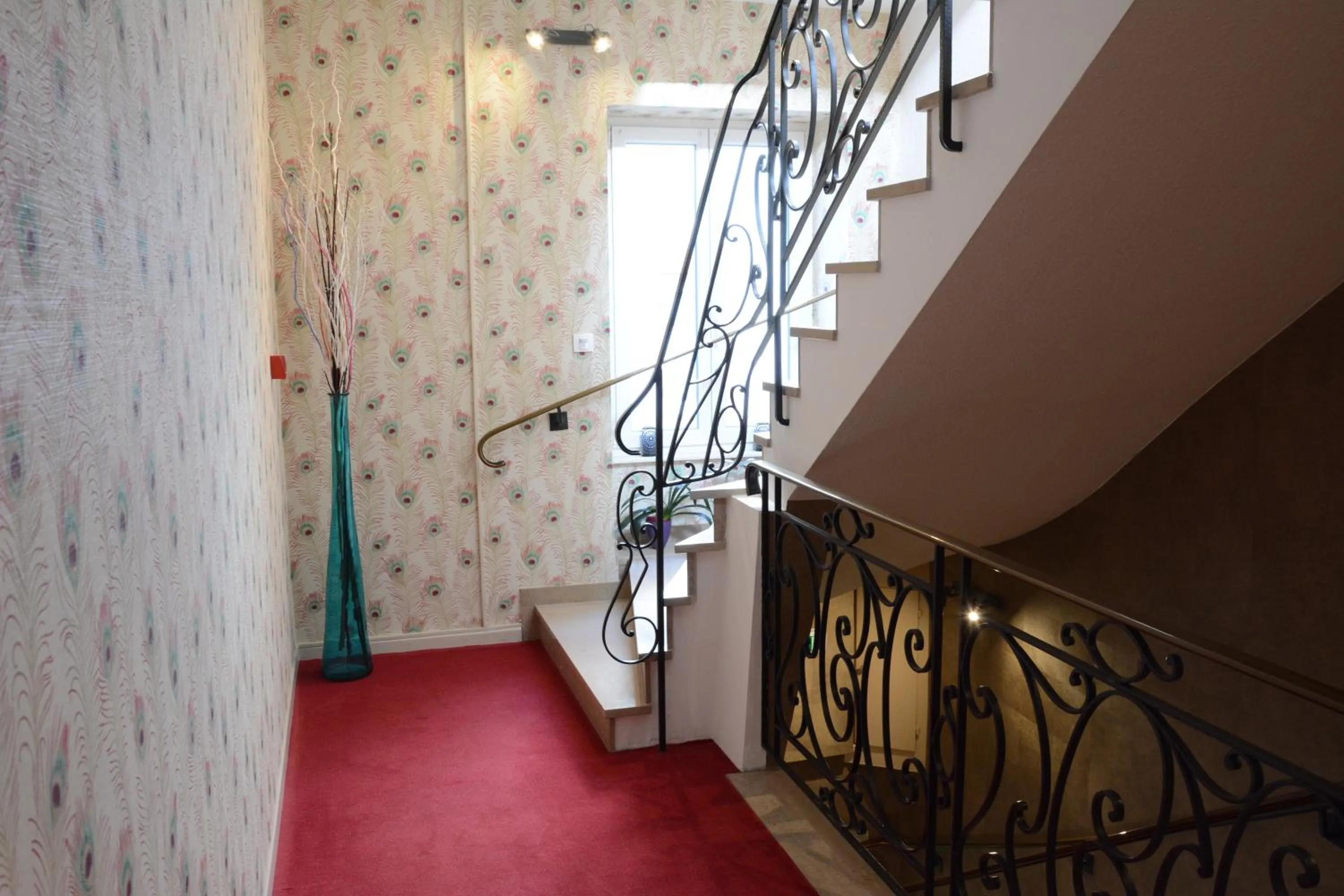 Property building in Logis Hôtel du Centre - Halte idéale en cyclotourisme avec garage à vélos clos