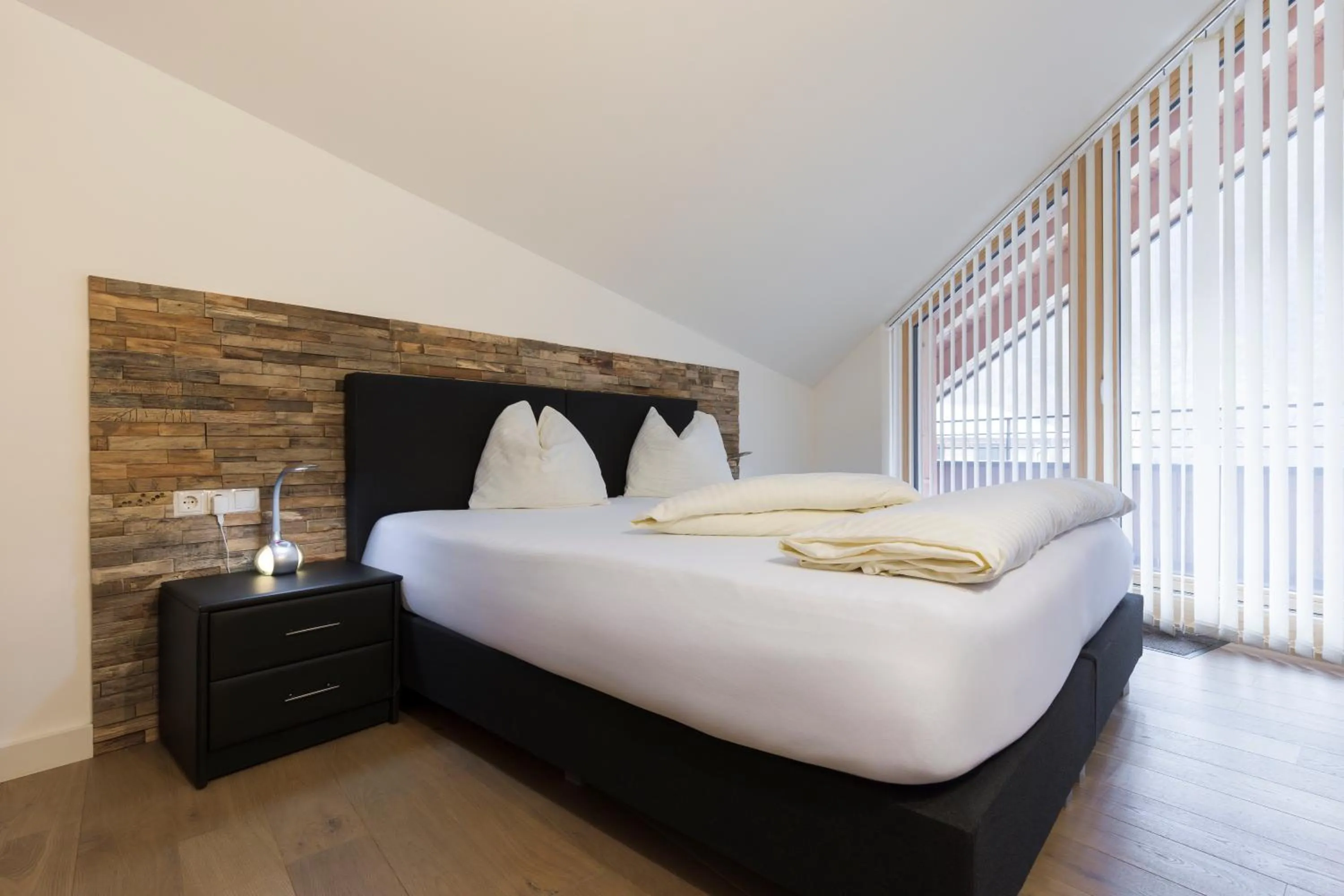 Bedroom, Bed in Aparthotel Herzblick GmbH