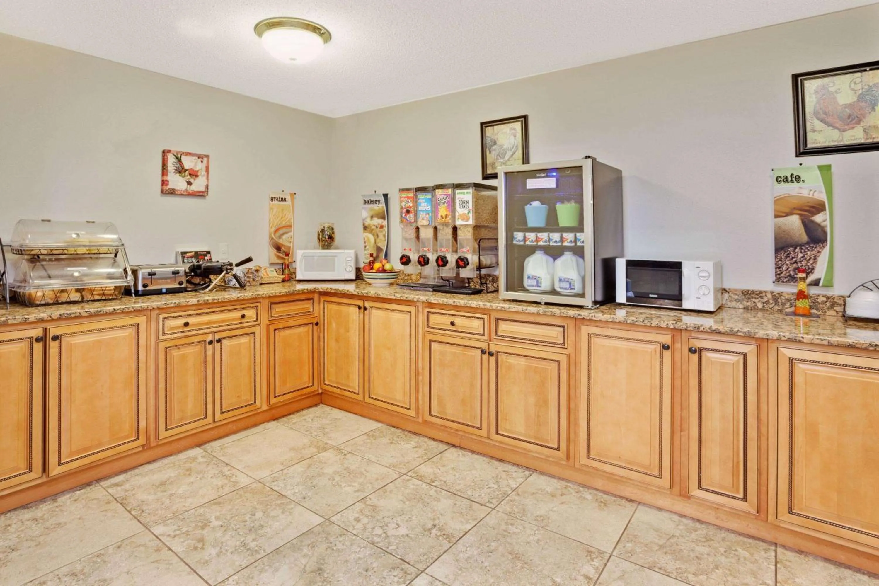 Buffet breakfast in Microtel Inn & Suites by Wyndham Detroit Roseville