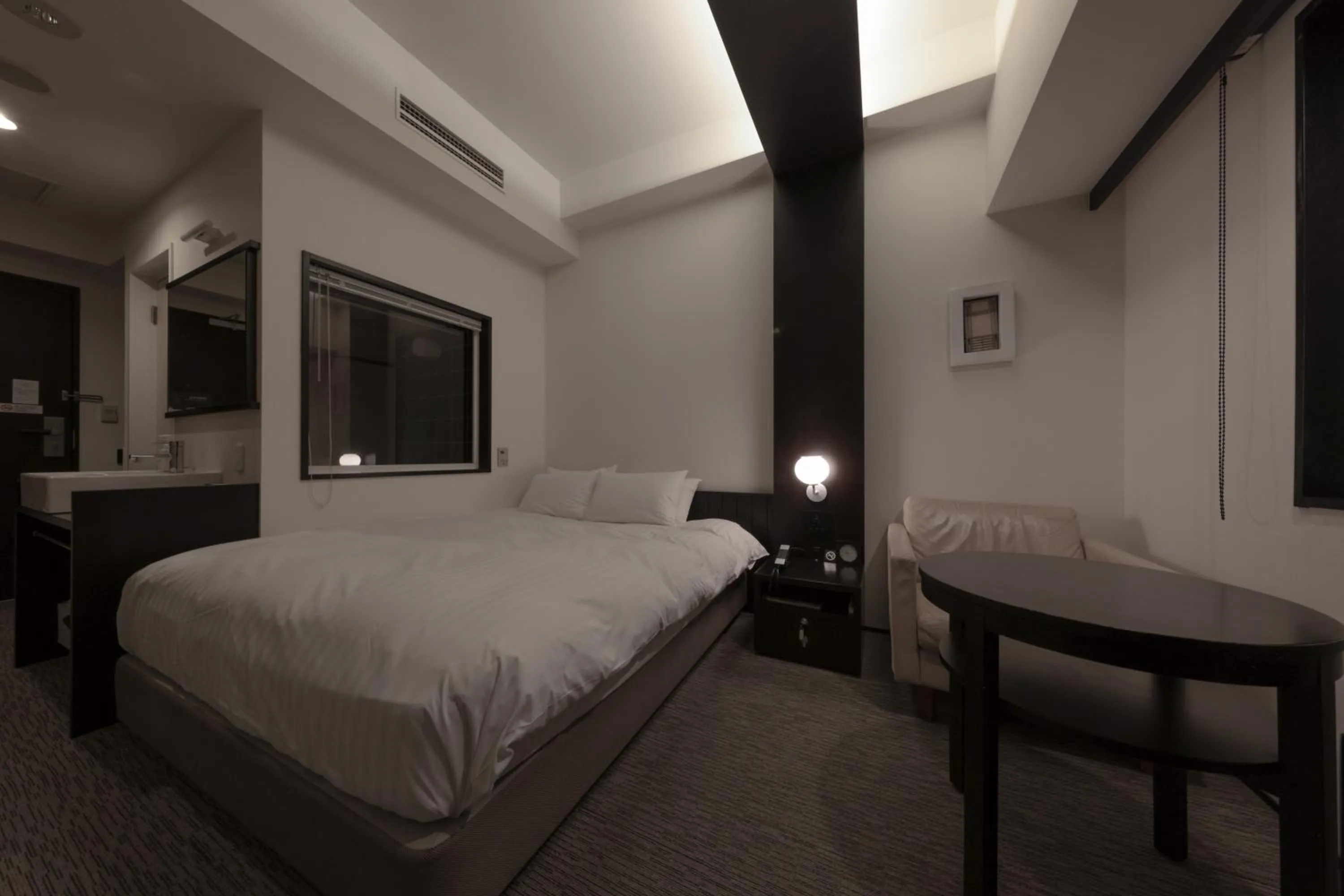 Bed in Furano Natulux Hotel