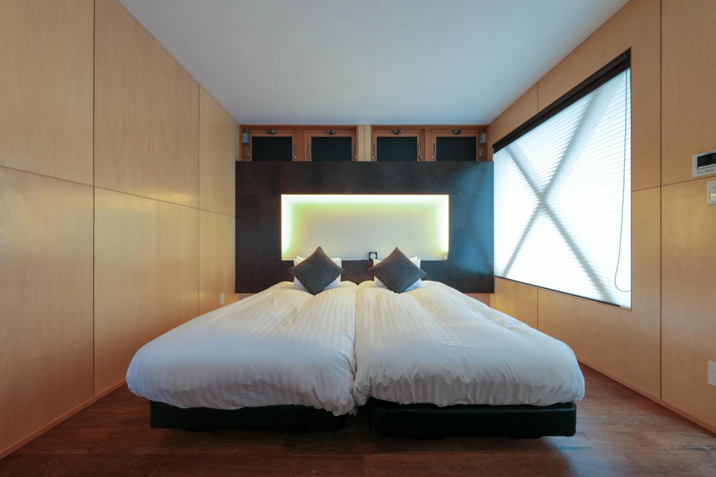 Bed in Furano Natulux Hotel