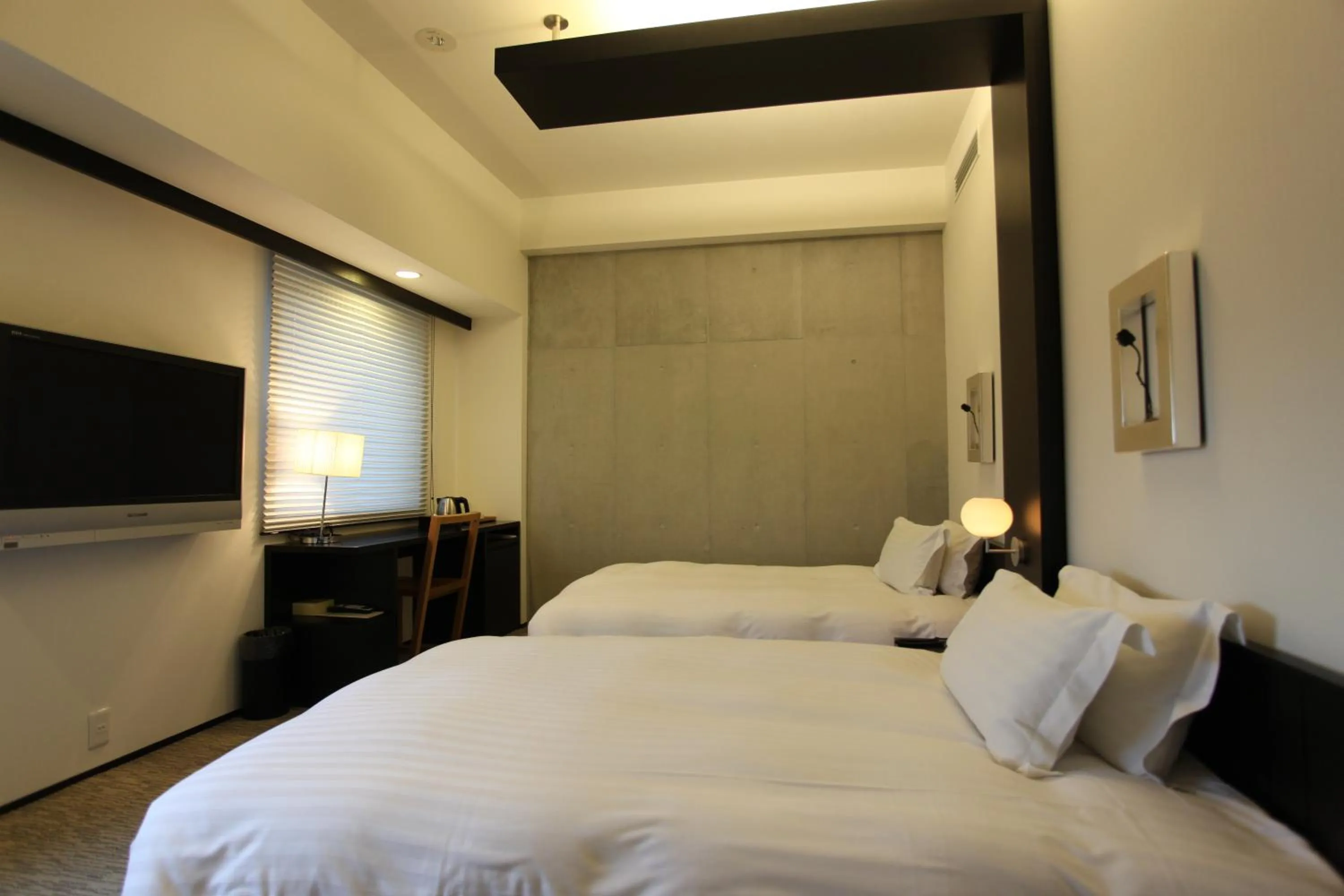 Photo of the whole room, Bed in Furano Natulux Hotel