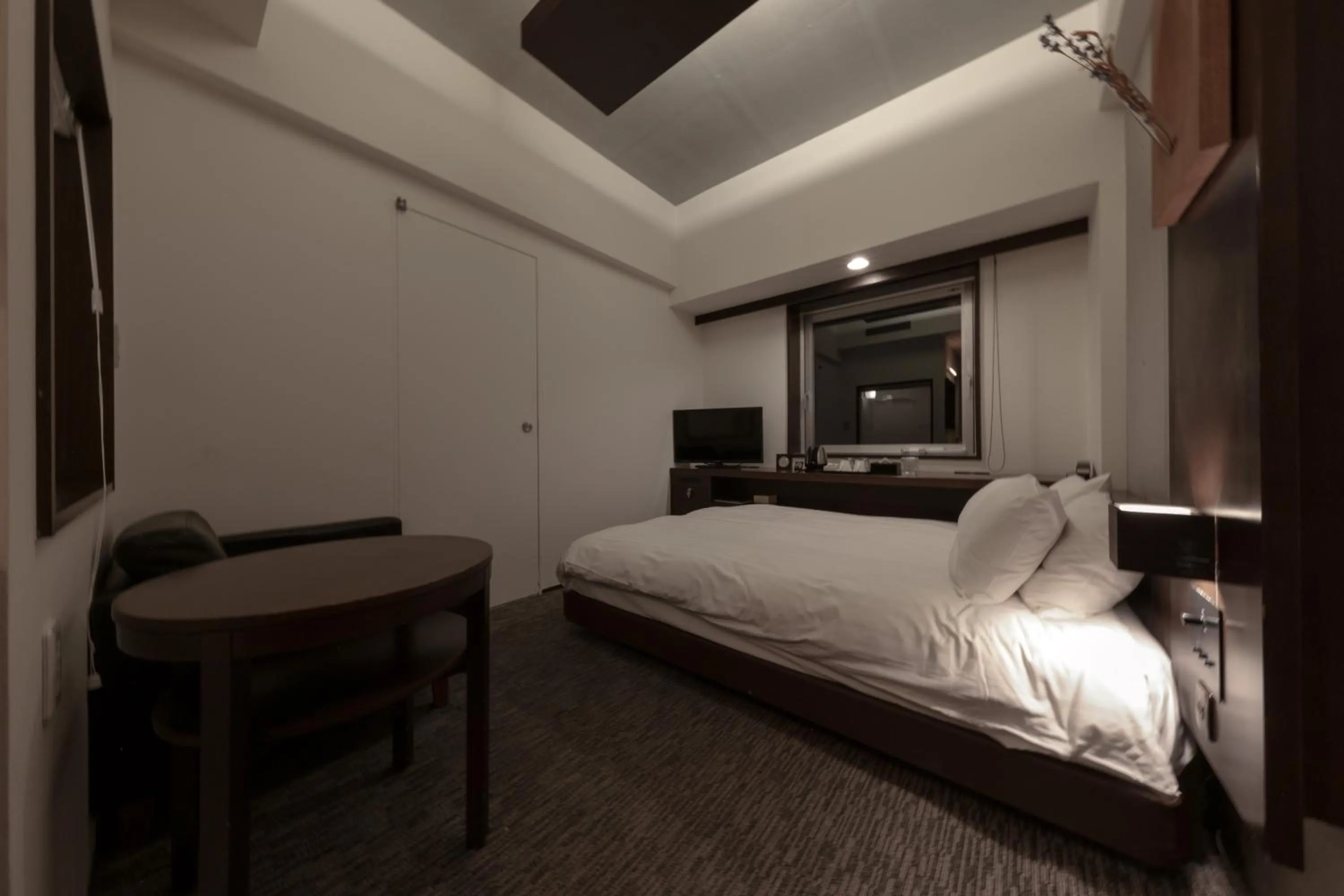 Bed in Furano Natulux Hotel