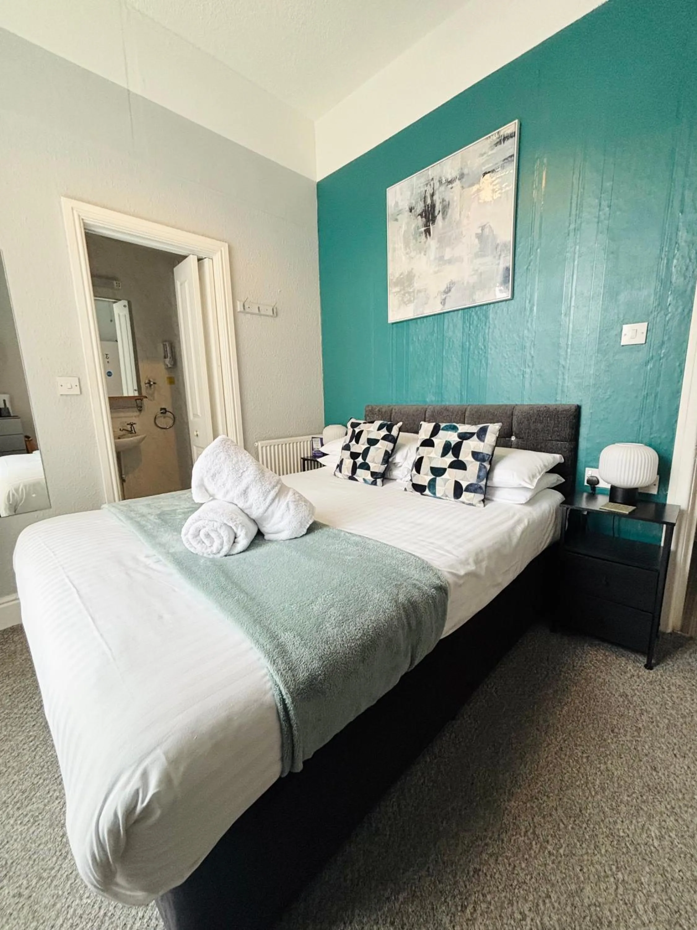 Bed in Three Palms Hotel