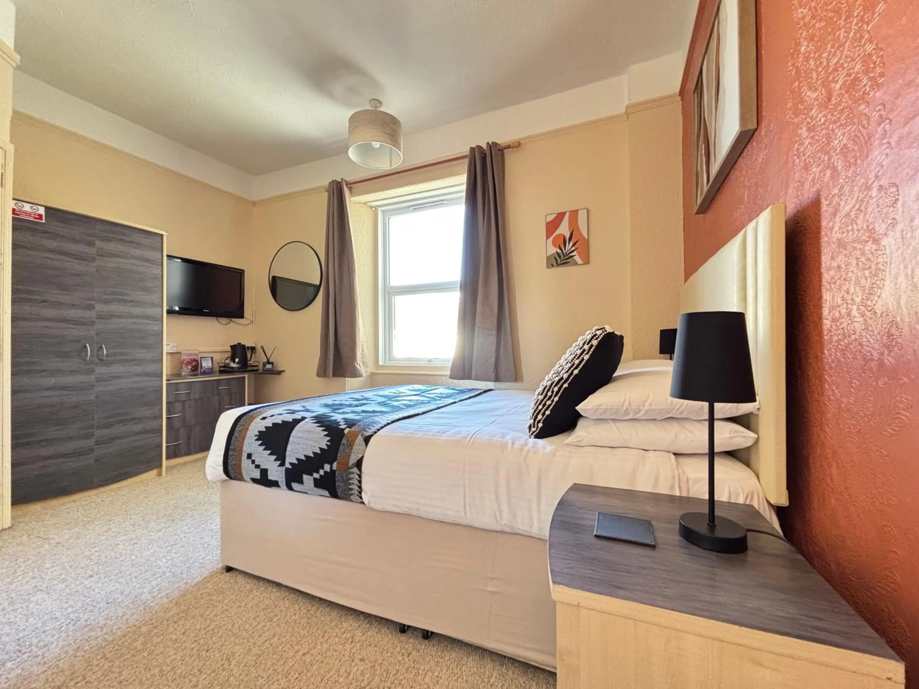 Bed in Three Palms Hotel