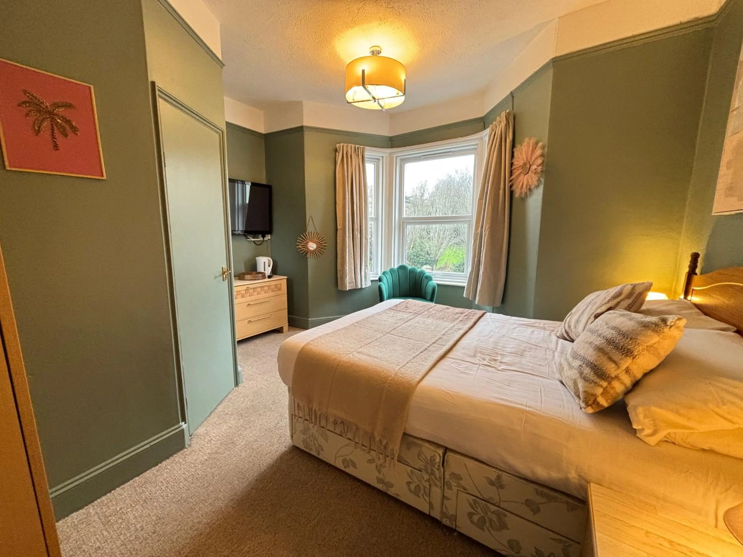 Bed in Three Palms Hotel