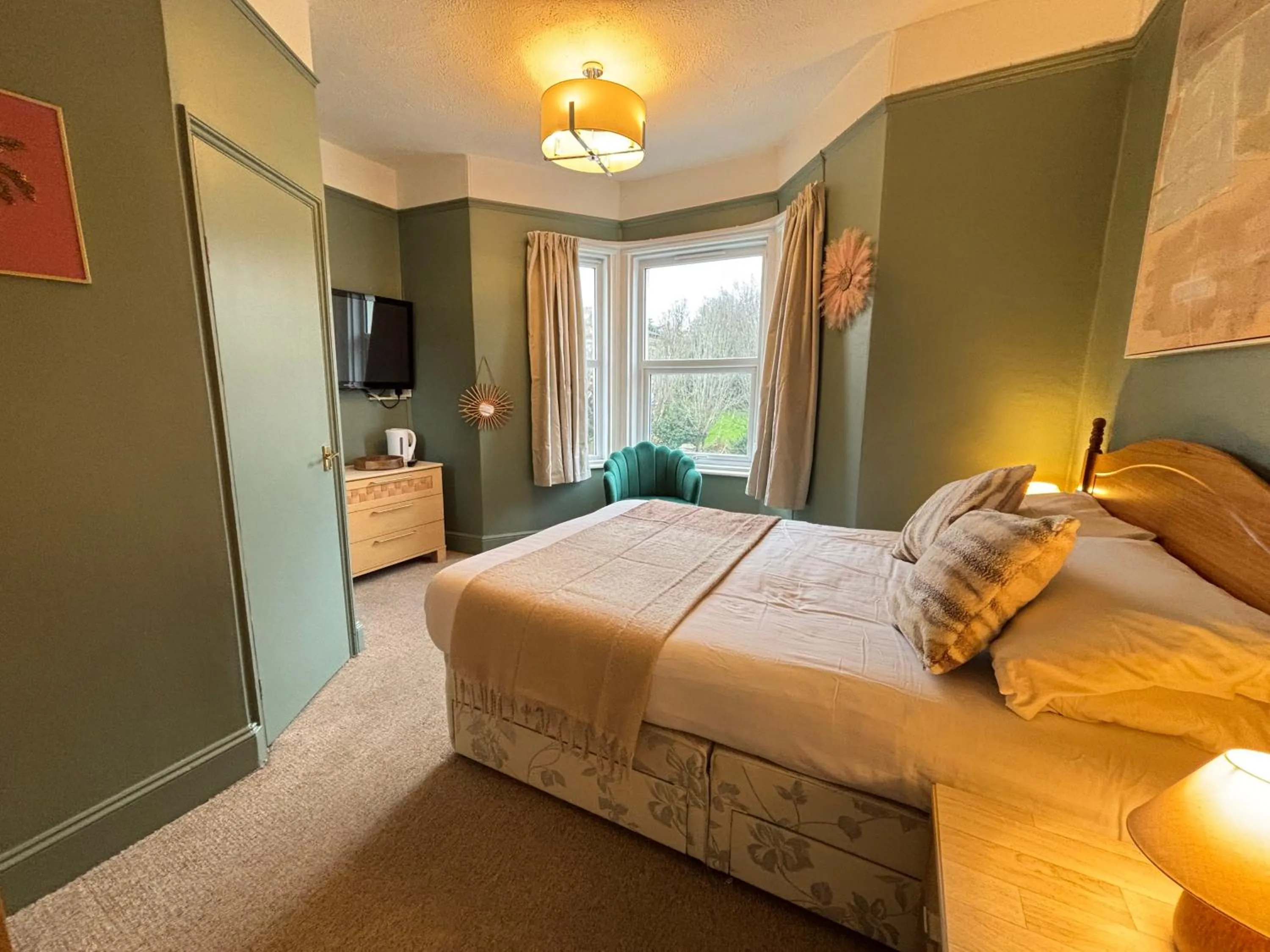 Bed in Three Palms Hotel