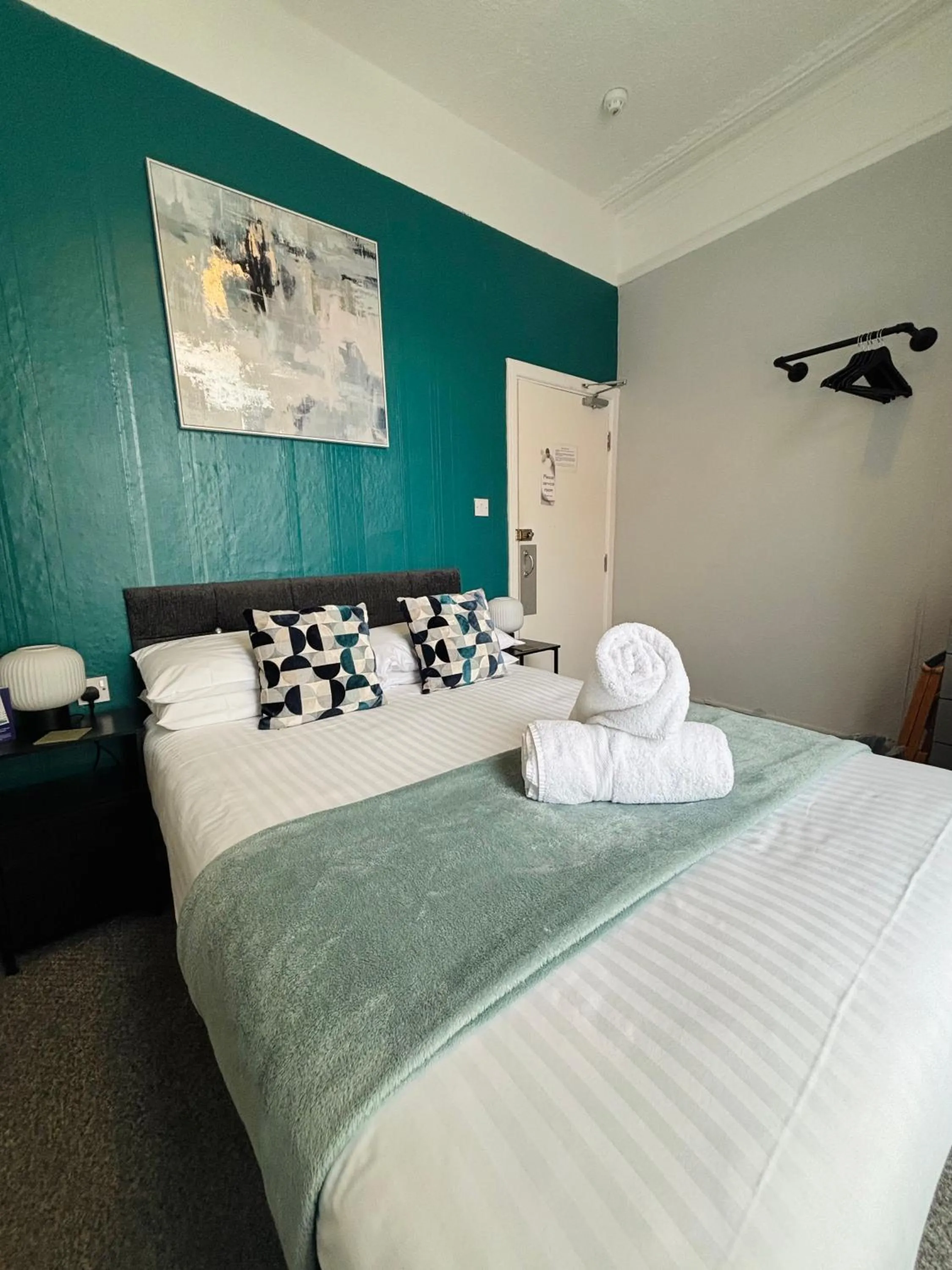 Bed in Three Palms Hotel