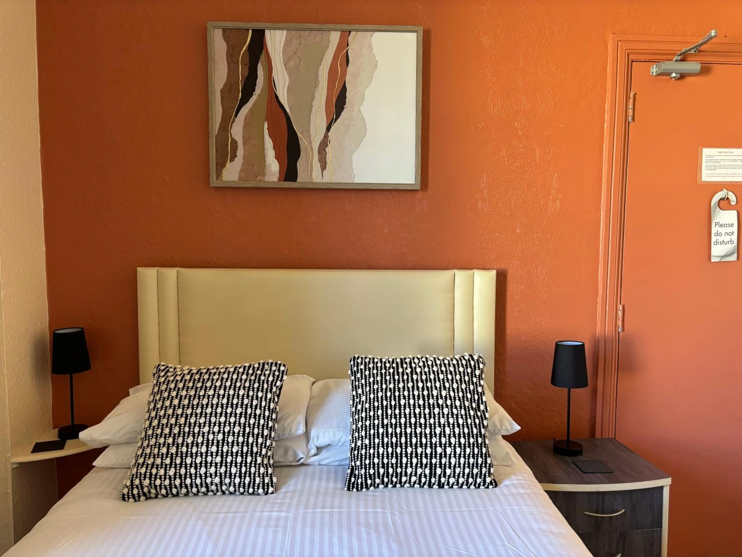 Bed in Three Palms Hotel