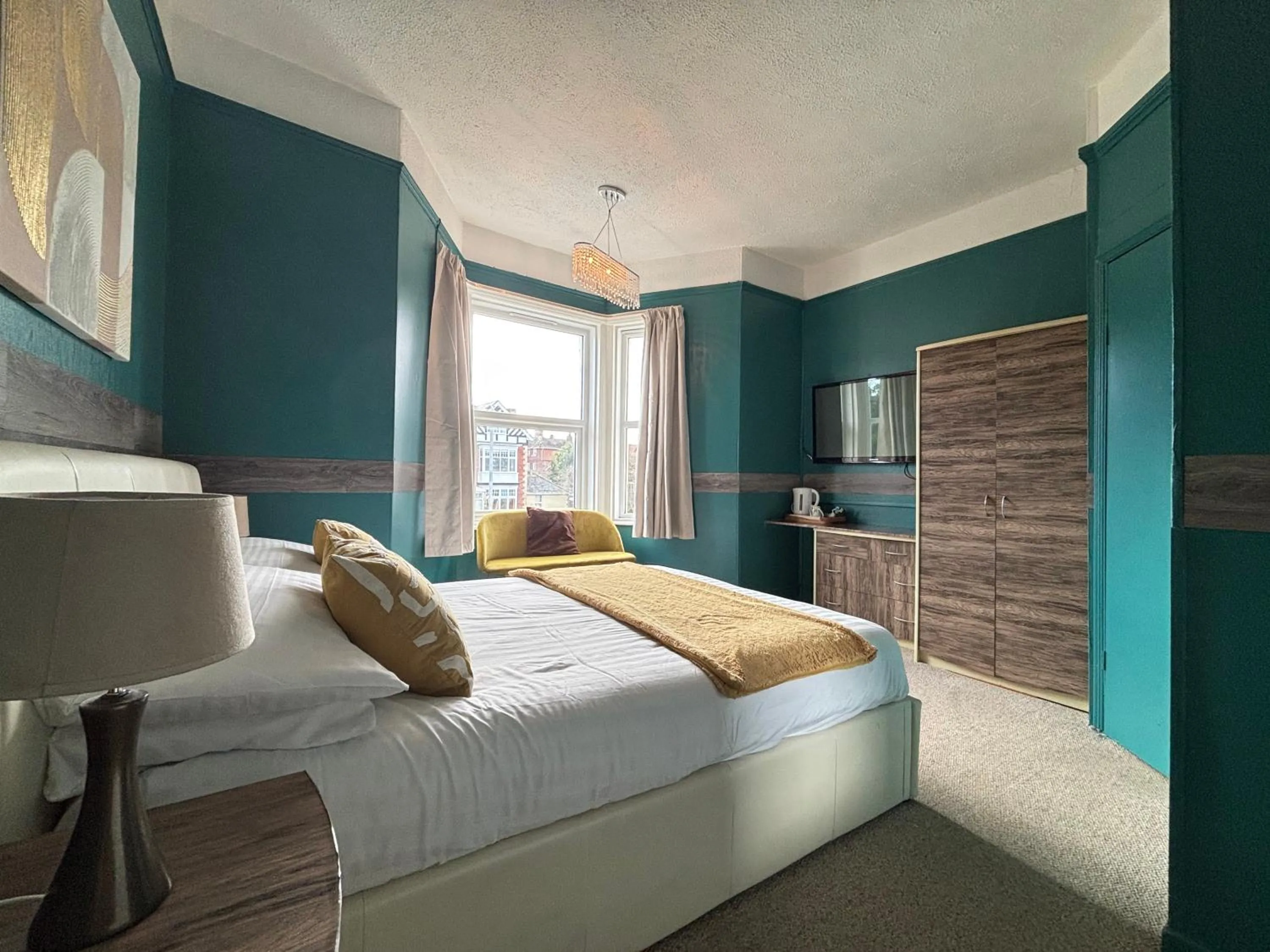 Bed in Three Palms Hotel