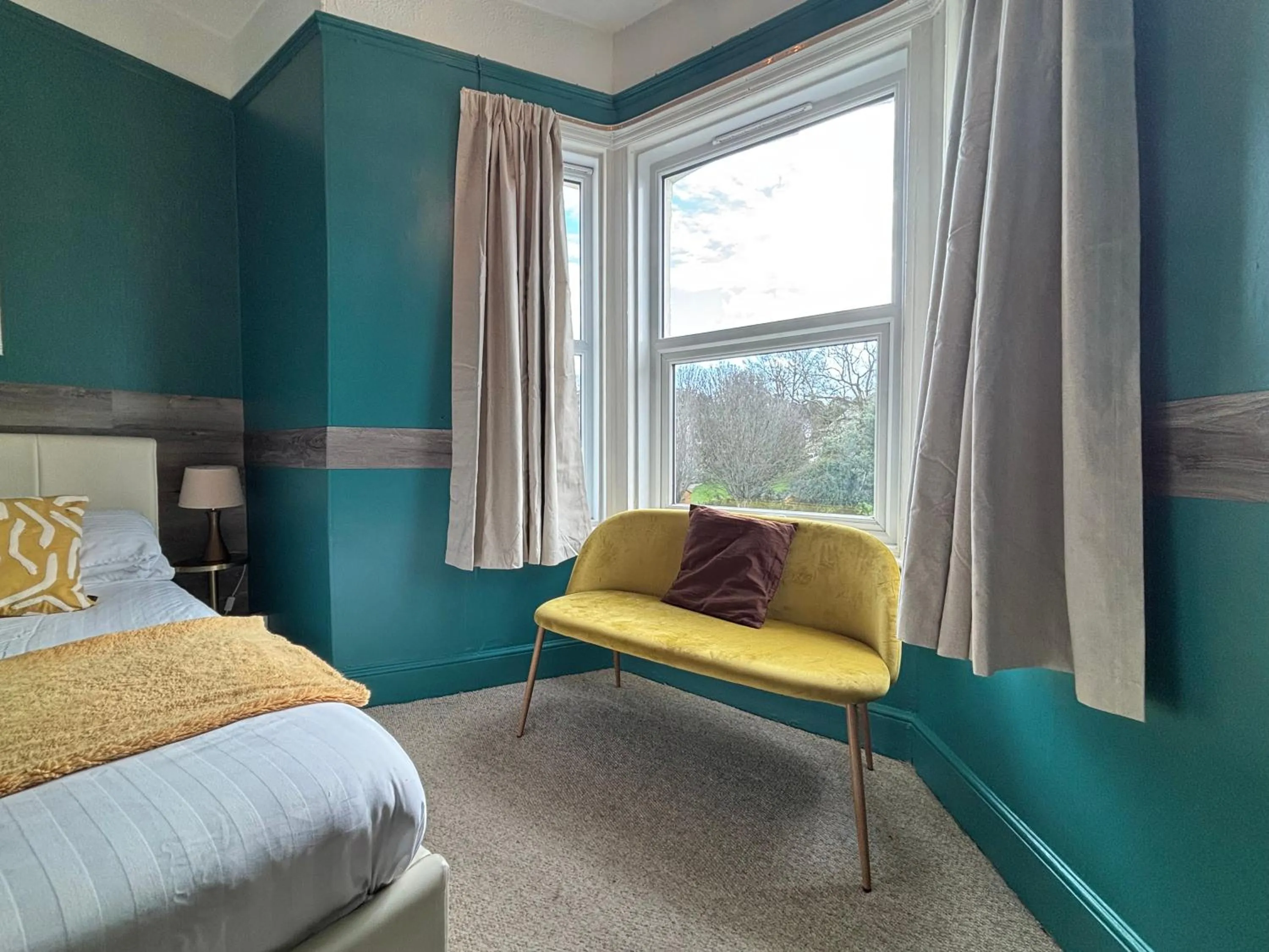 Bed in Three Palms Hotel