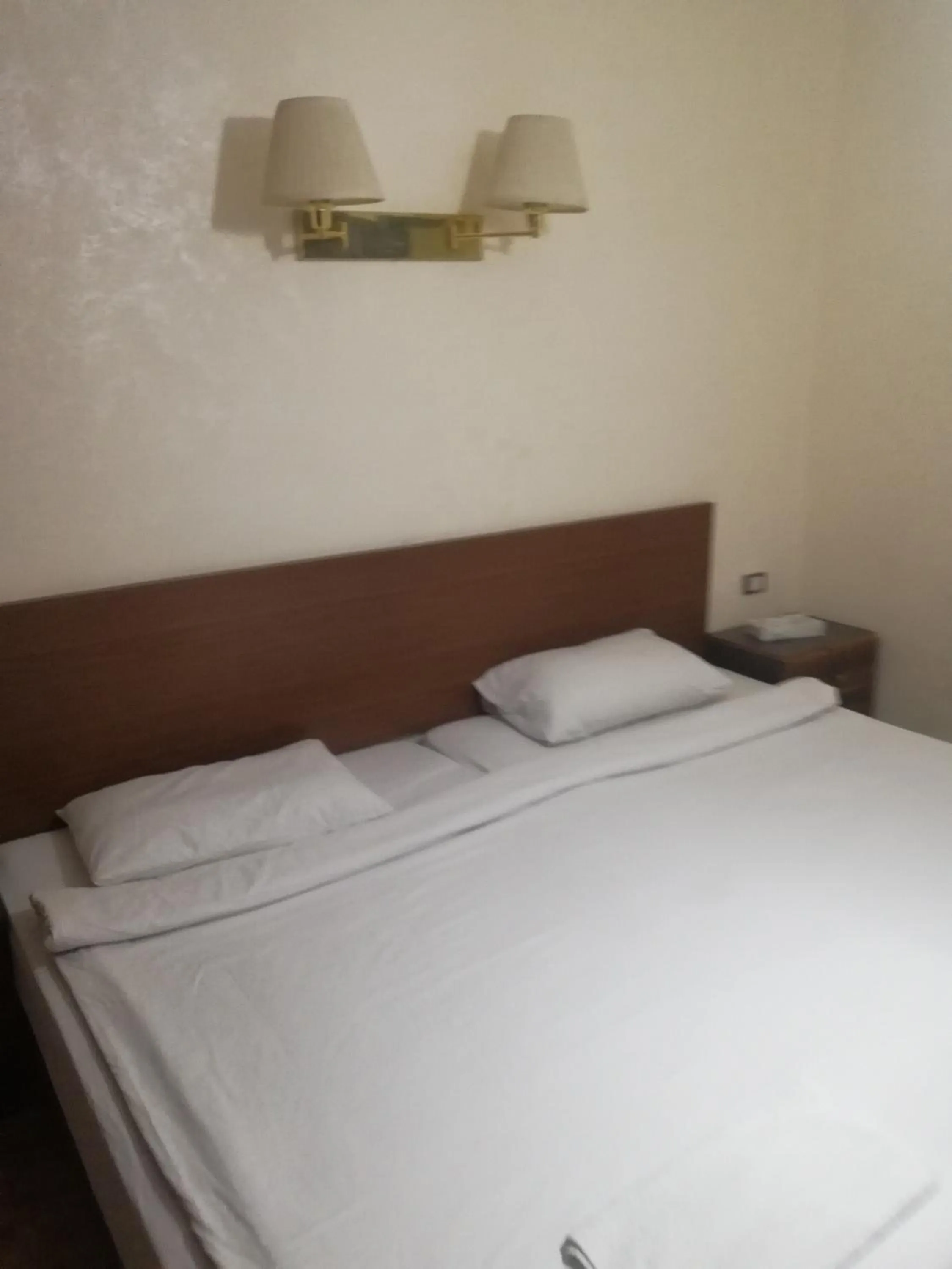 Bed in Al-Houriat Hotel