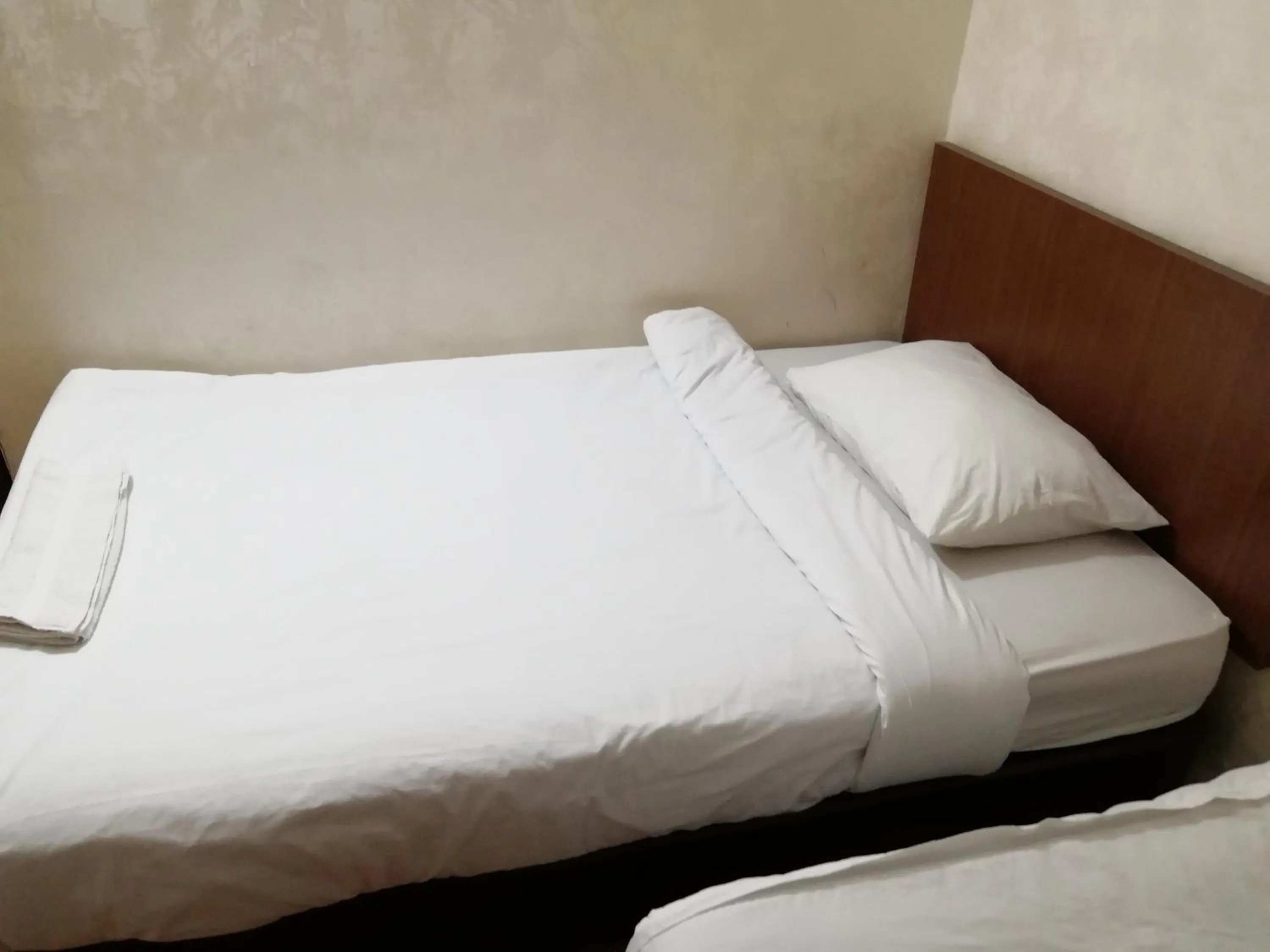 Bed in Al-Houriat Hotel
