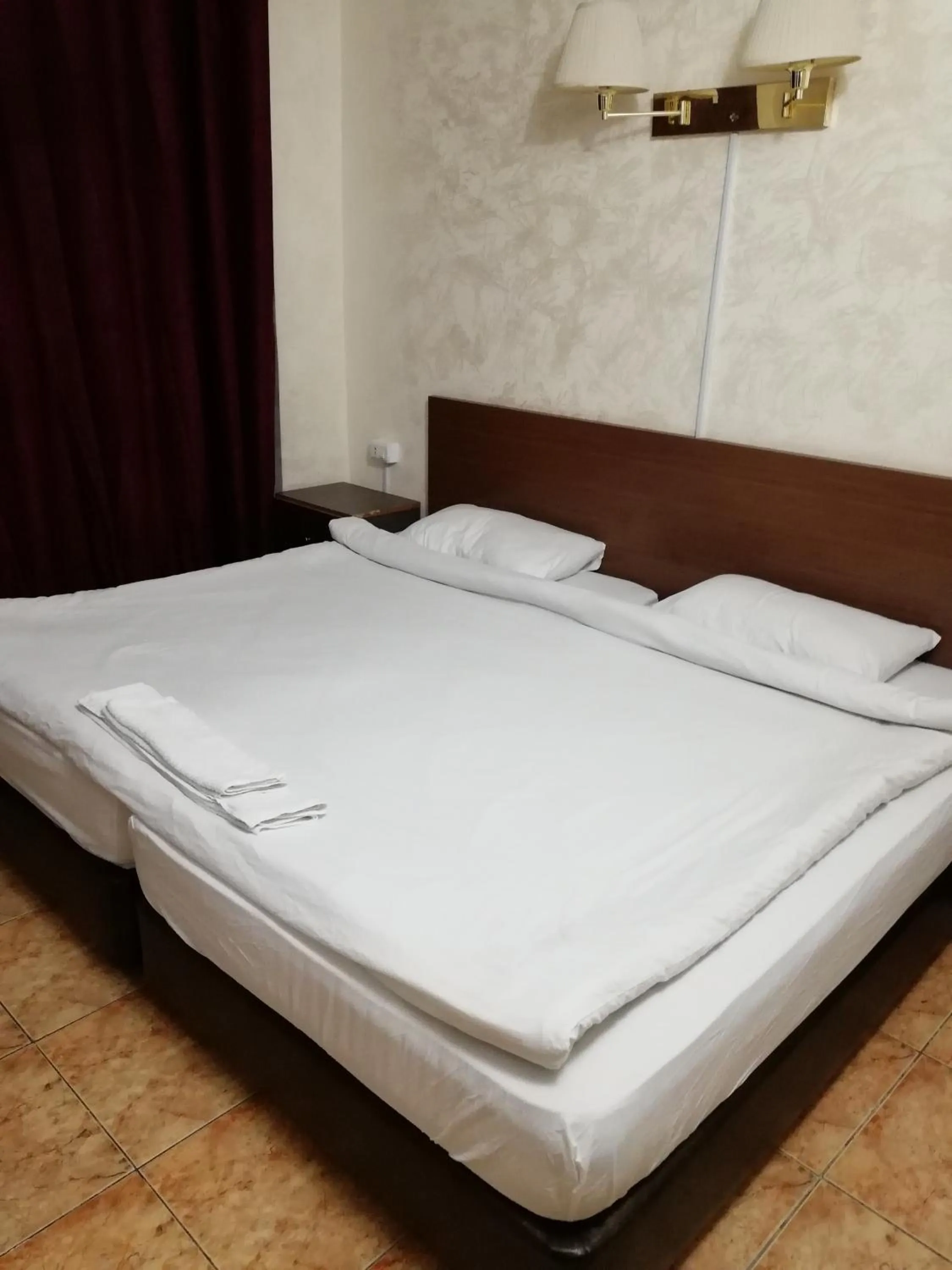 Bed in Al-Houriat Hotel