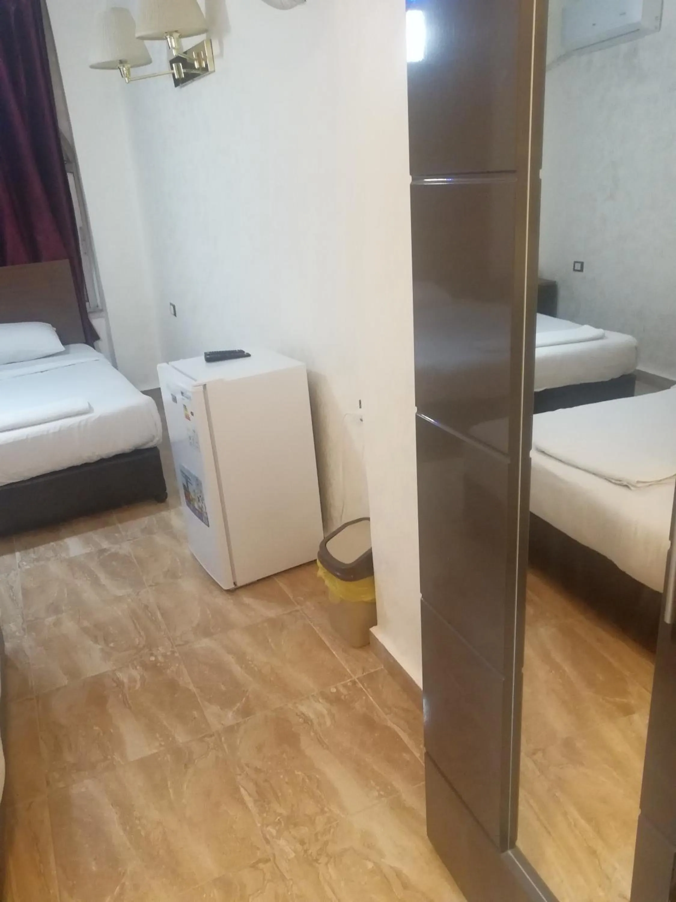 Bed in Al-Houriat Hotel