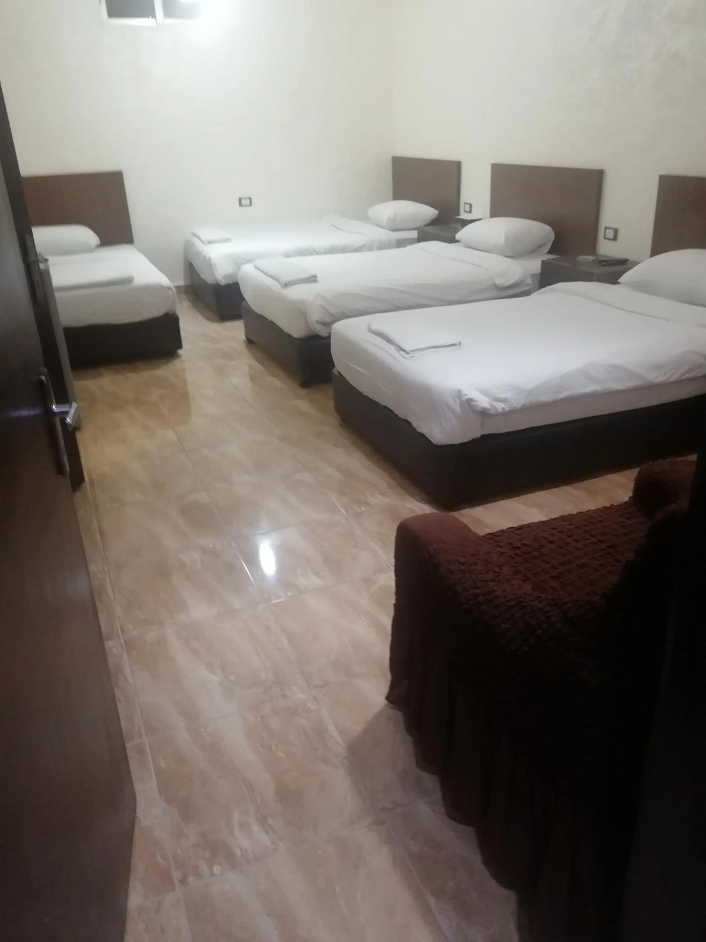 Bed in Al-Houriat Hotel