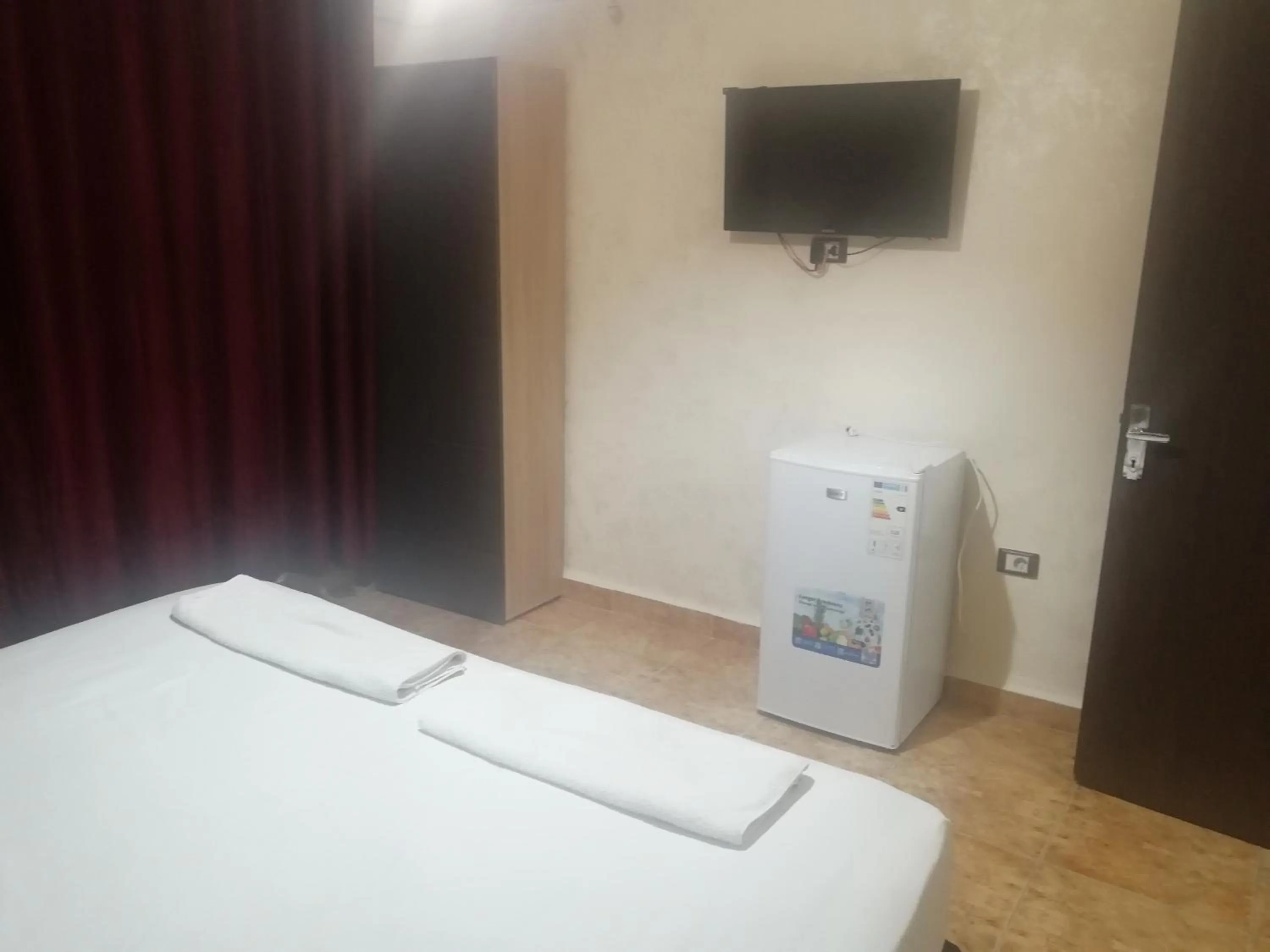 Bed in Al-Houriat Hotel