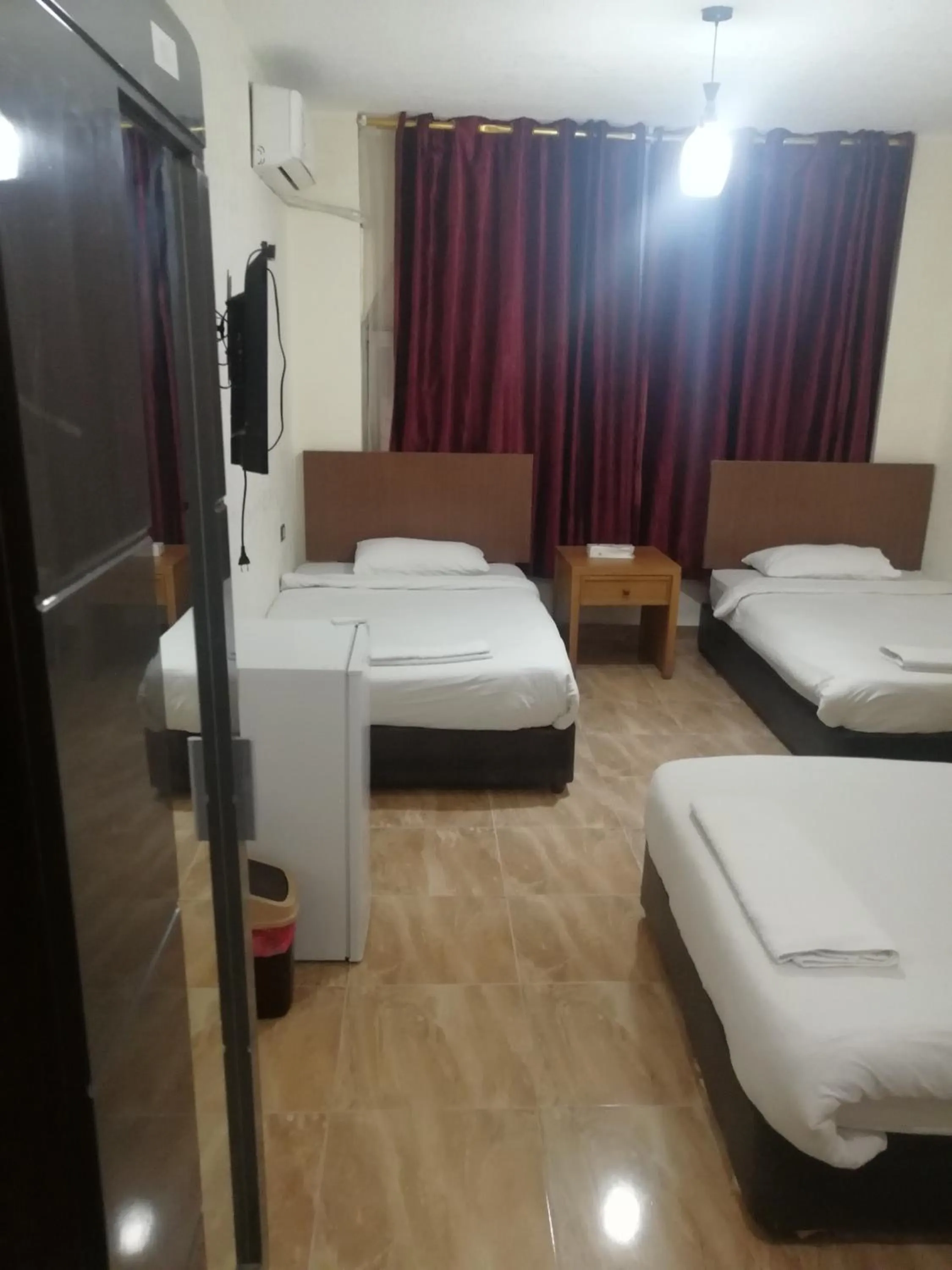 Bed in Al-Houriat Hotel