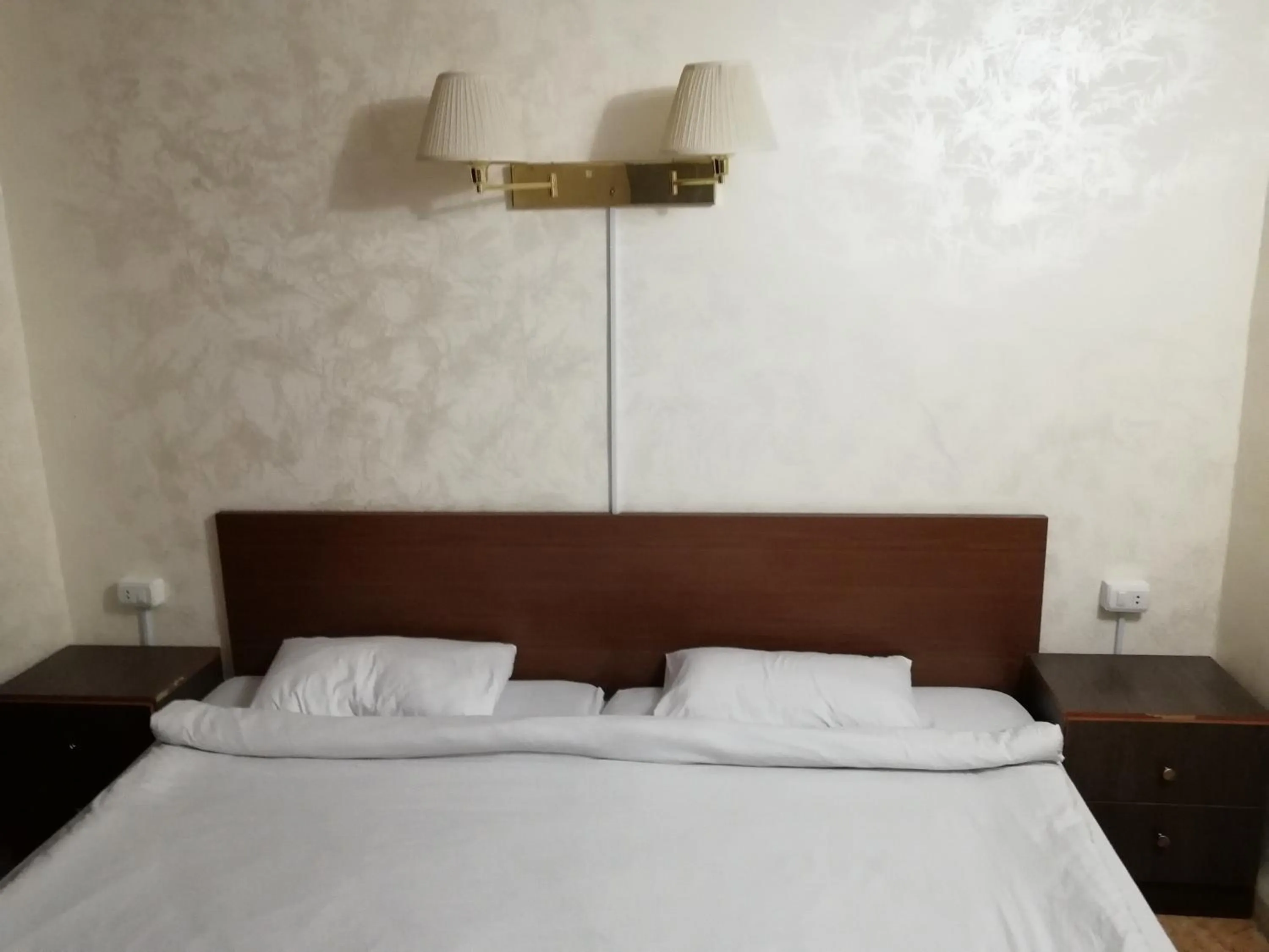 Bed in Al-Houriat Hotel