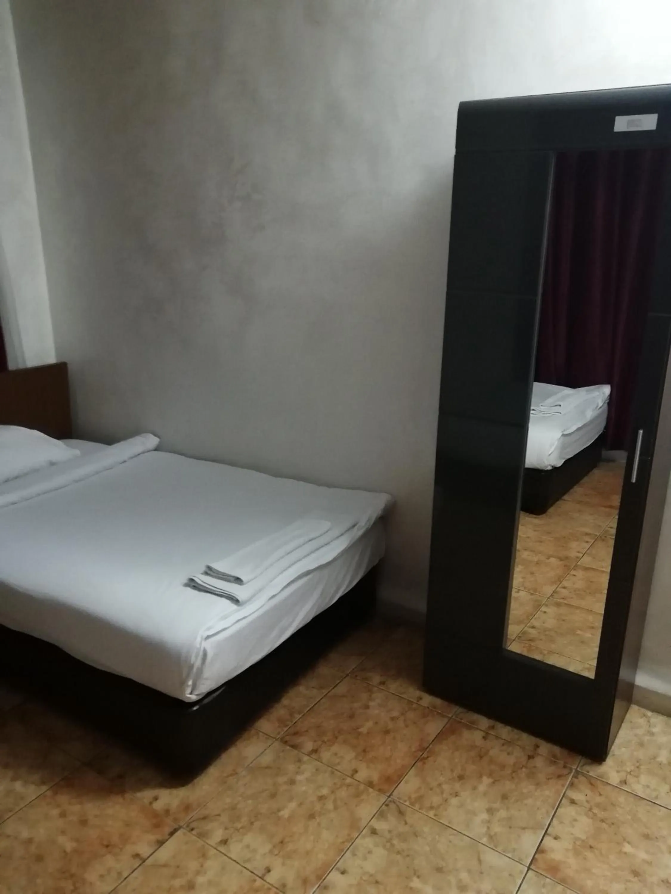 Bed in Al-Houriat Hotel