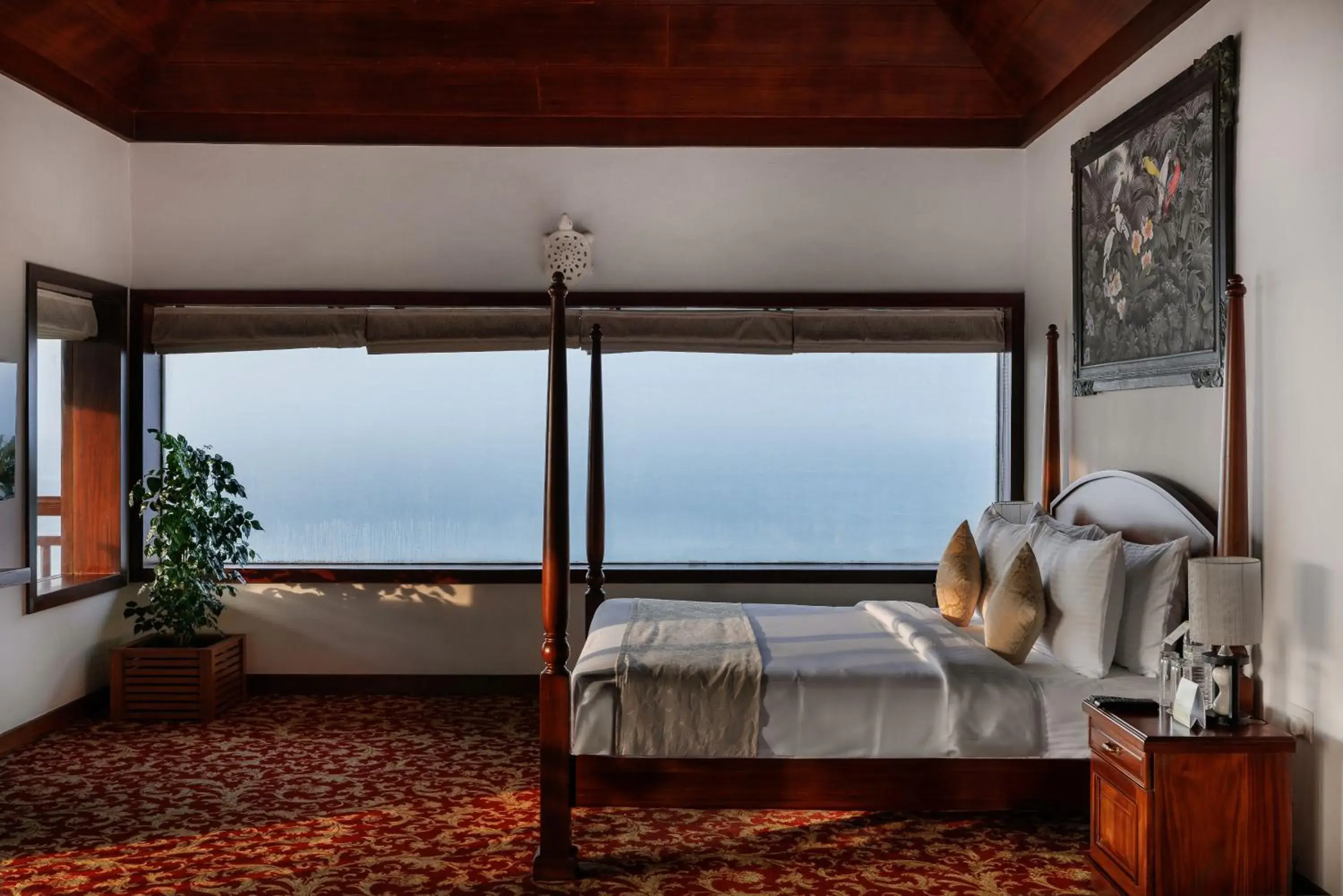 Bed in Gokulam Grand Turtle On The Beach Bed in Gokulam Grand Turtle On The Beach