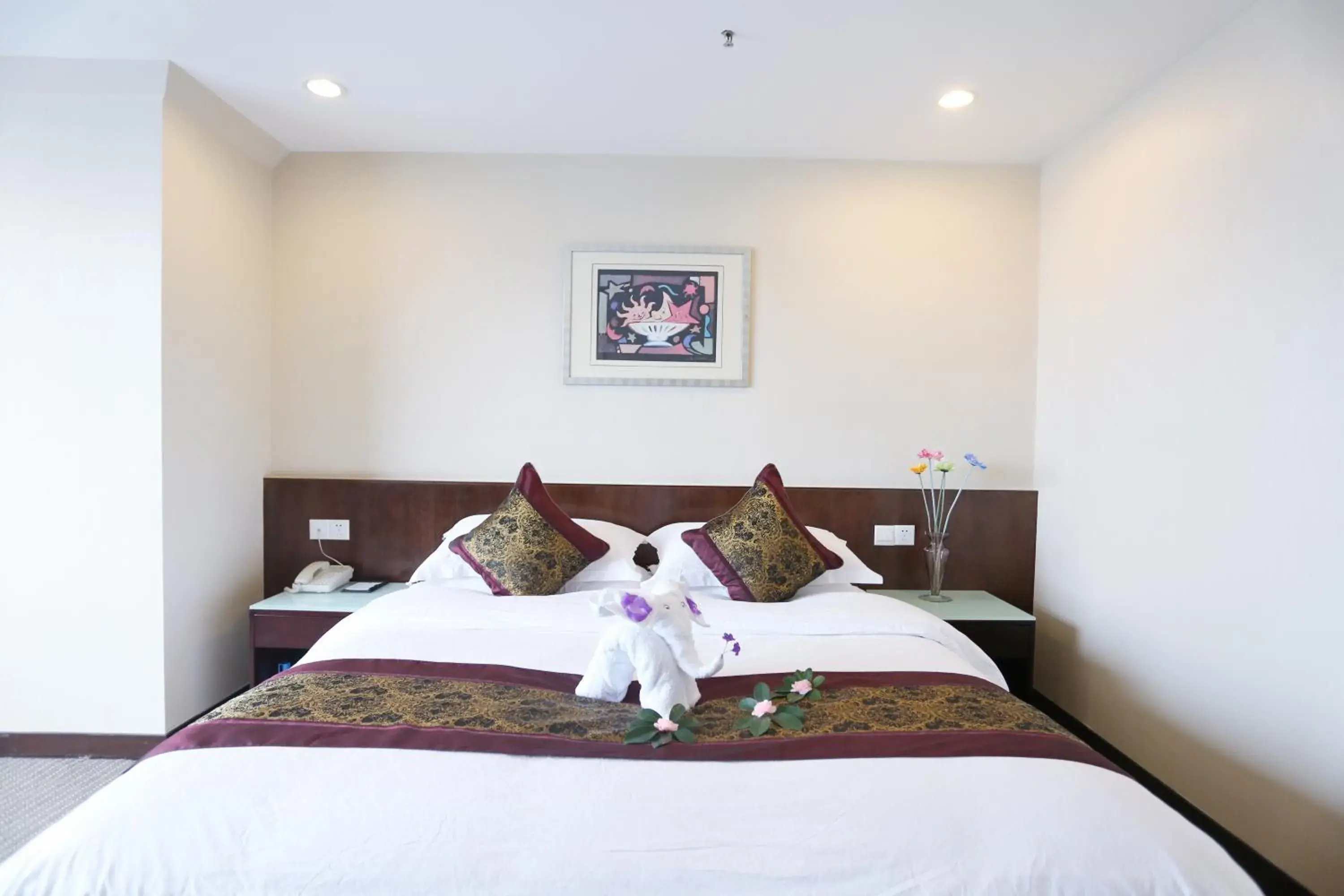 Bed in Yihe Hotel Ouzhuang Bed in Yihe Hotel Ouzhuang