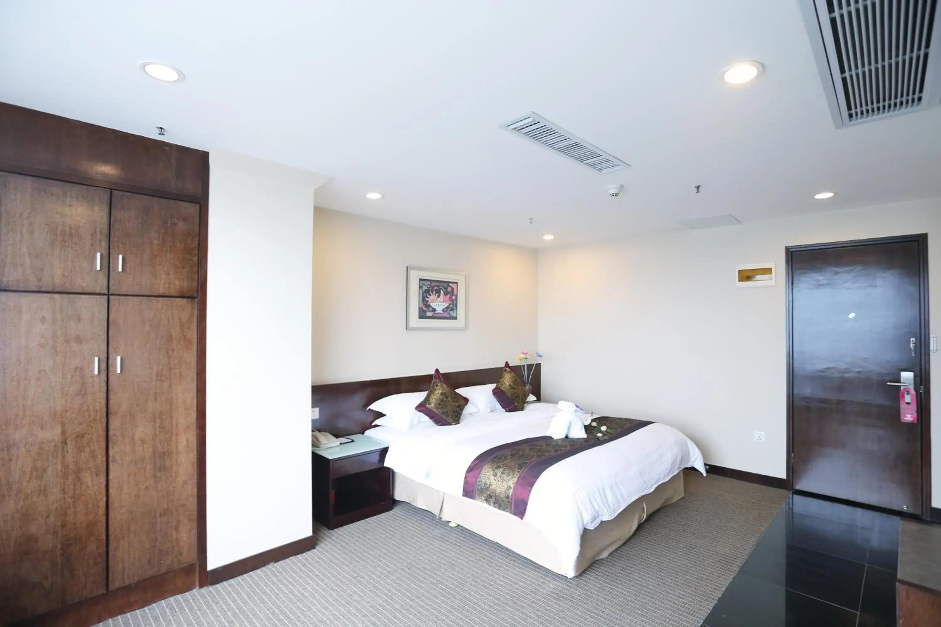 Bed in Yihe Hotel Ouzhuang Bed in Yihe Hotel Ouzhuang