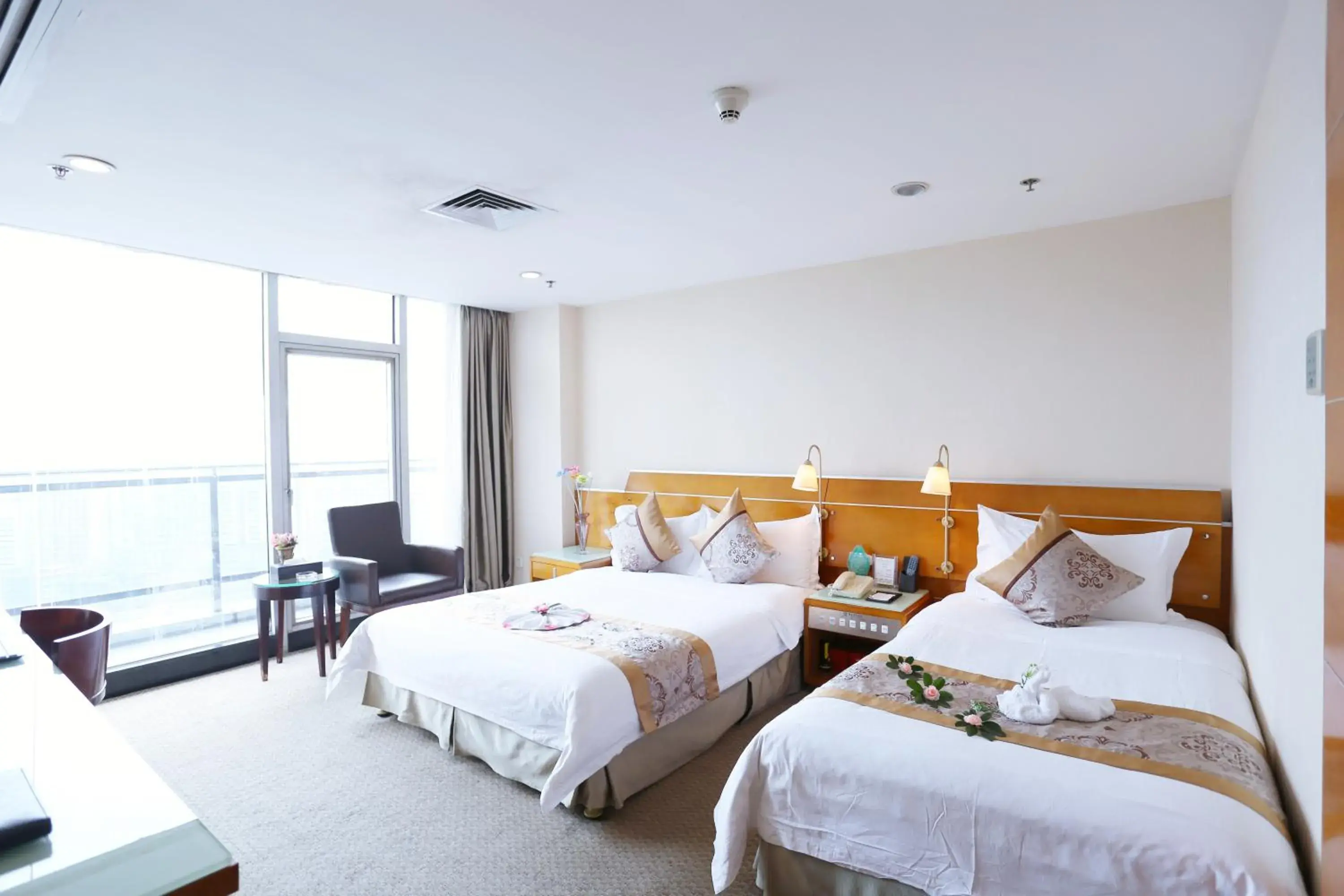 Bed in Yihe Hotel Ouzhuang Bed in Yihe Hotel Ouzhuang