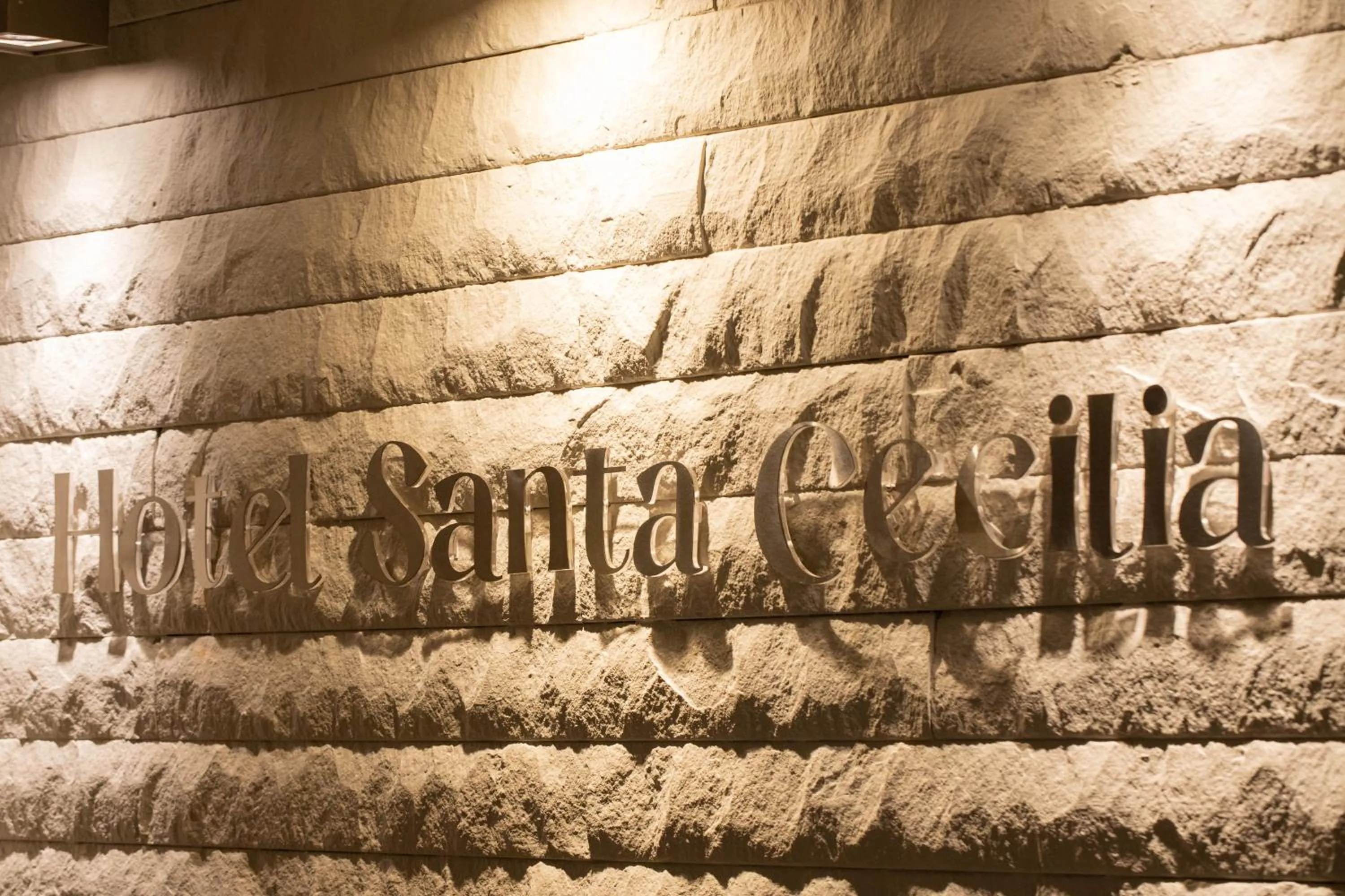 Property logo or sign in Hotel Santa Cecilia B&B
