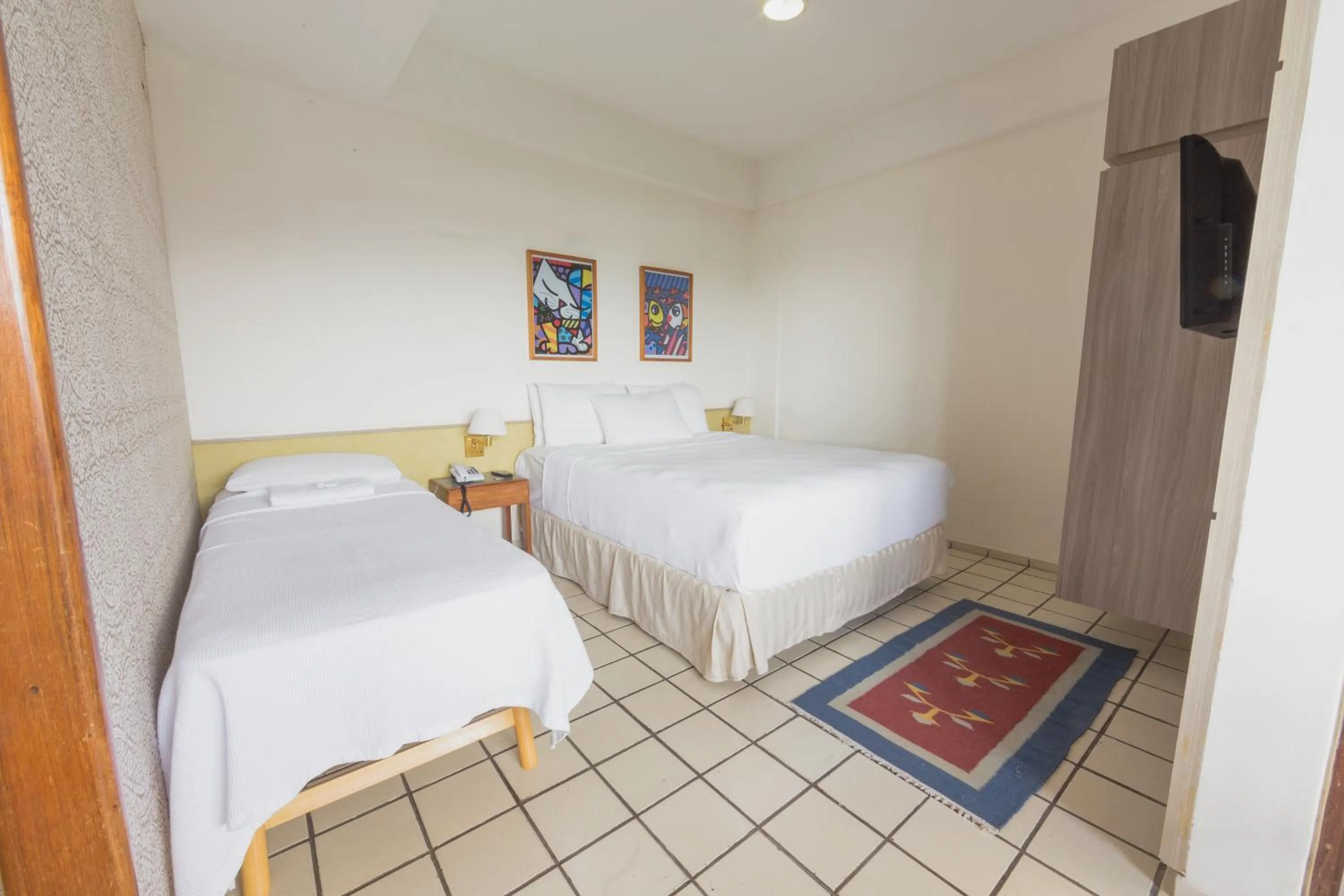 Bed in Xênius Hotel