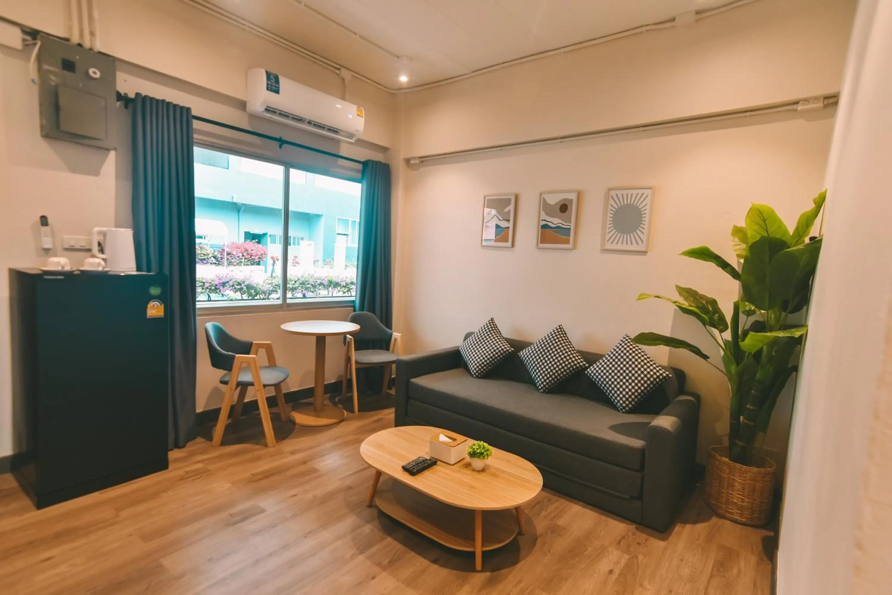 Living room in THALAY Cha-am by THA