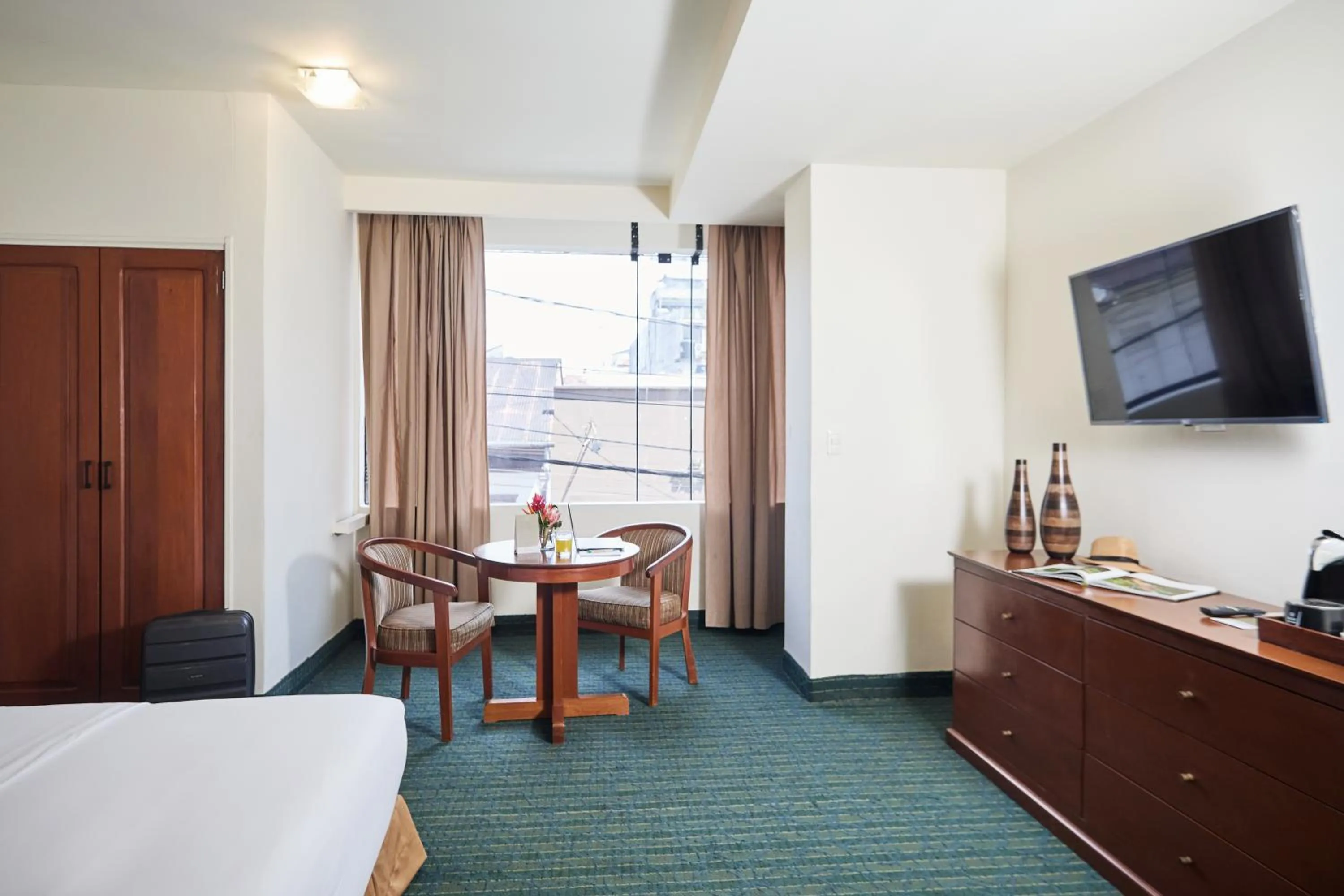 Bed in El Dorado Classic Hotel