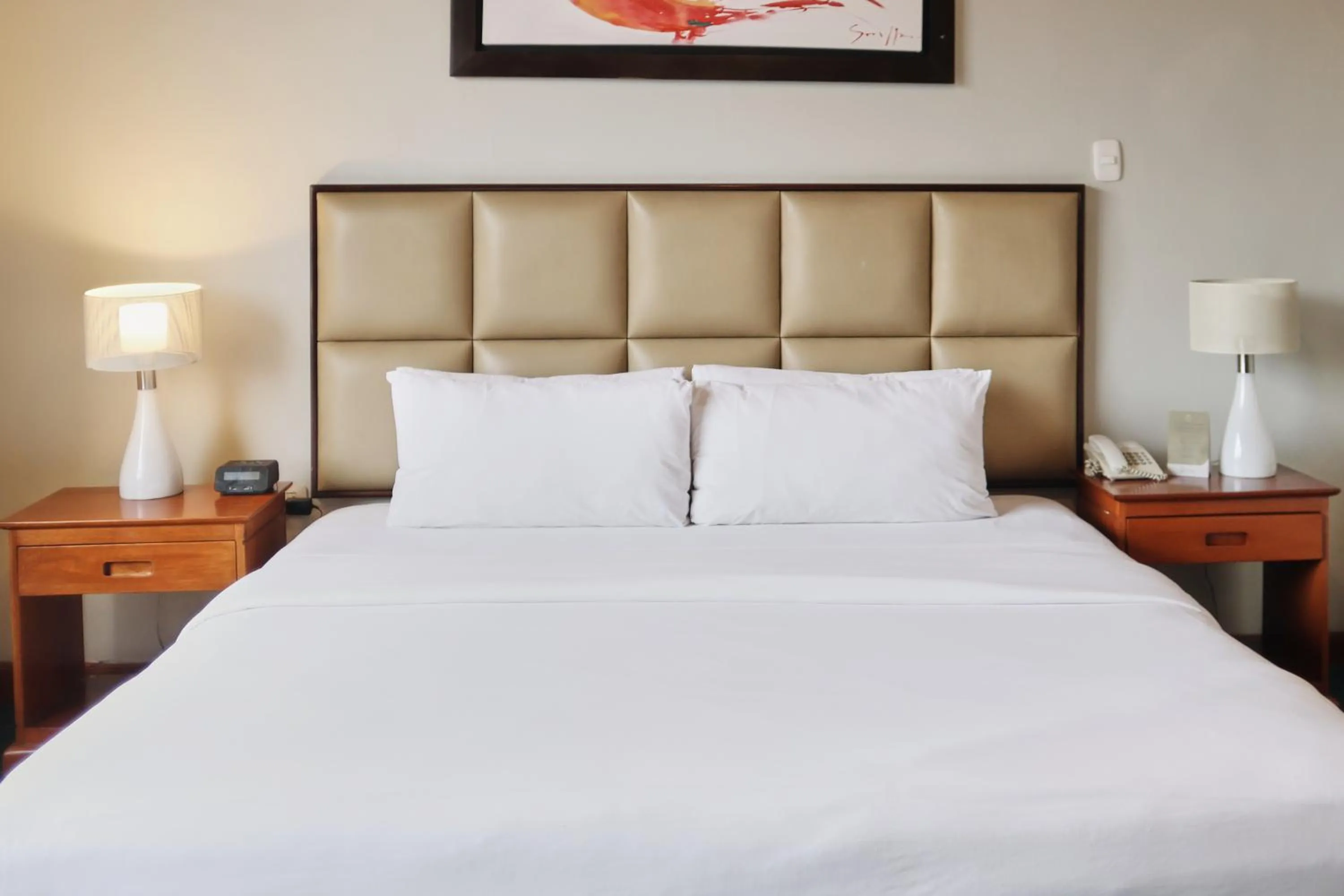 Bed in El Dorado Classic Hotel