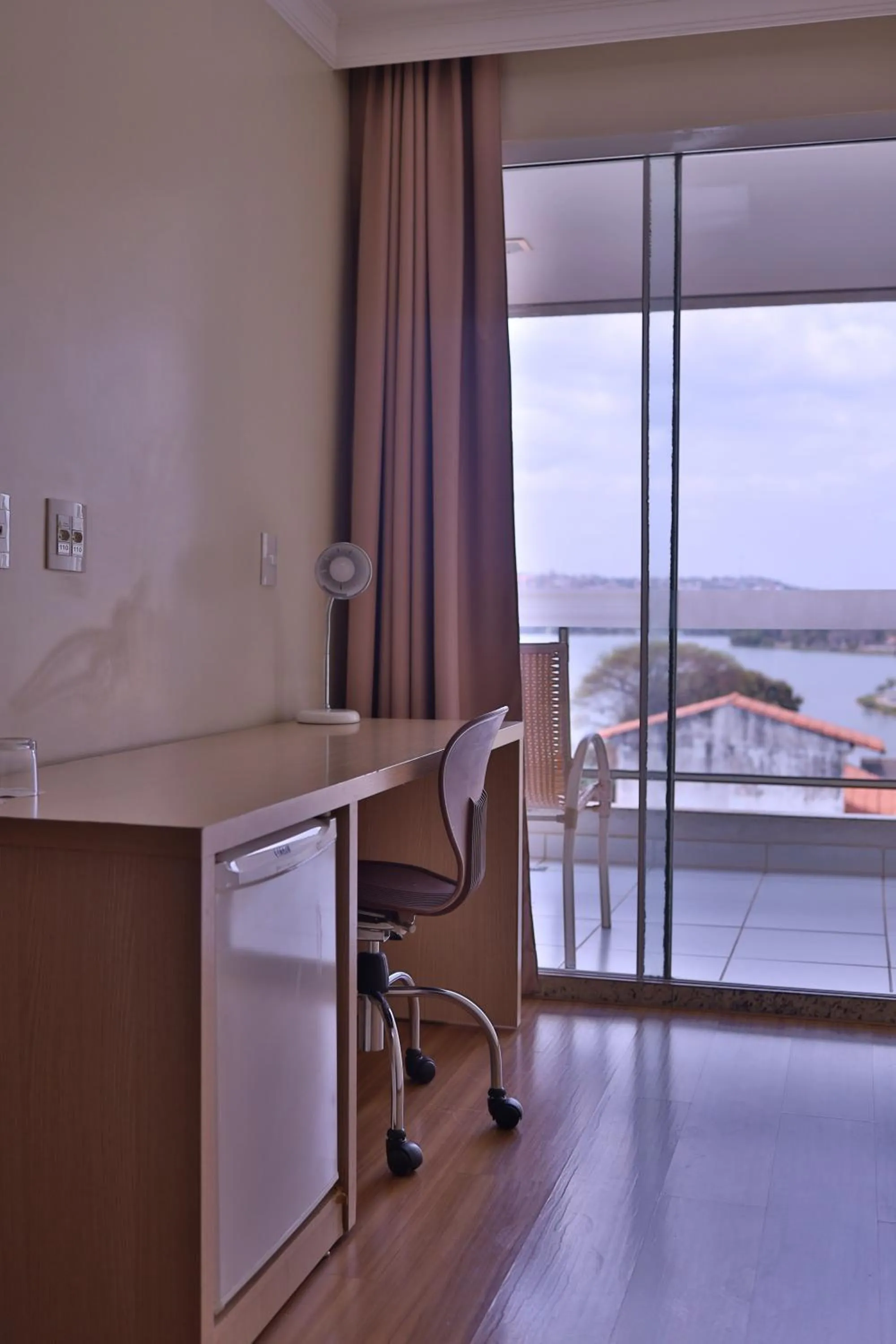 Bedroom in Ramada Hotel & Suites Lagoa Santa By Wyndham