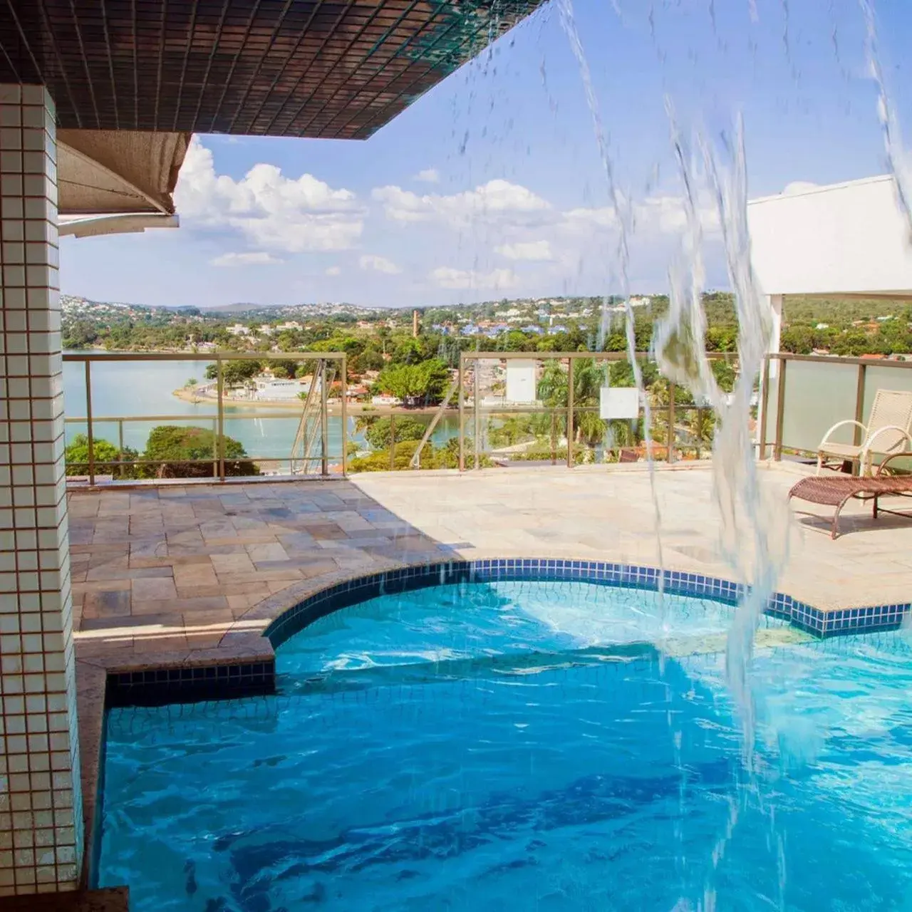 Pool view in Ramada Hotel & Suites Lagoa Santa By Wyndham Pool view in Ramada Hotel & Suites Lagoa Santa By Wyndham