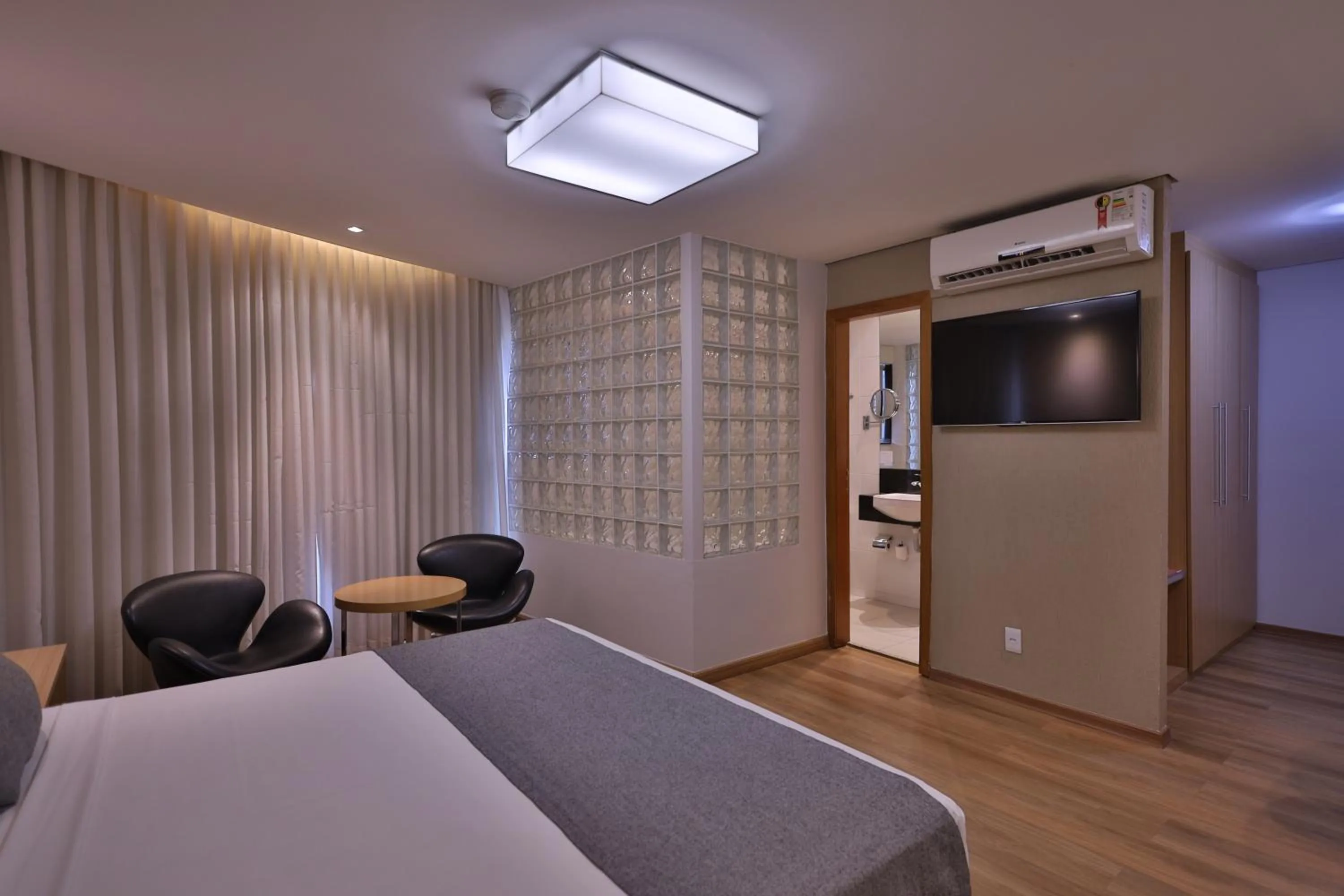 Bed in Ramada Hotel & Suites Lagoa Santa By Wyndham